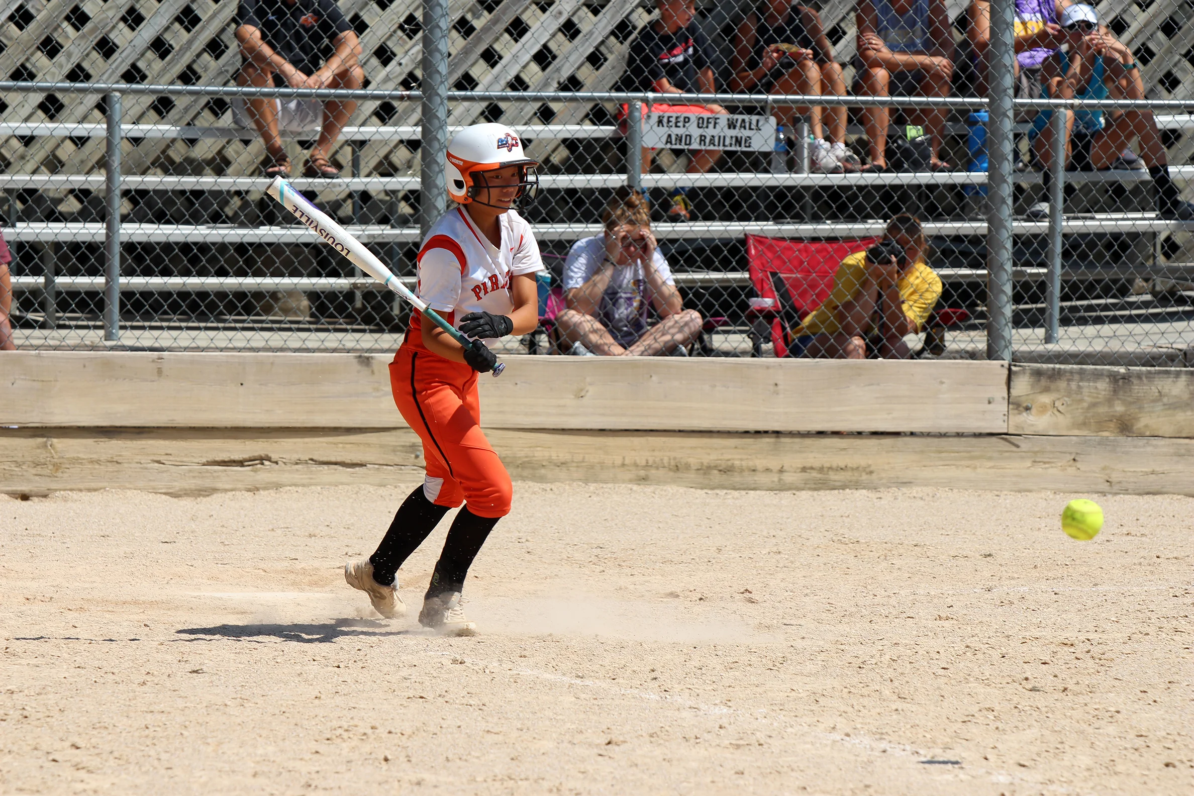 Platte County's Stephanie Carroll hits a grounder against Pleasant Hill on Saturday, Aug. 25 at the Greater Kansas City Softball Tournament in Independence, Mo.
