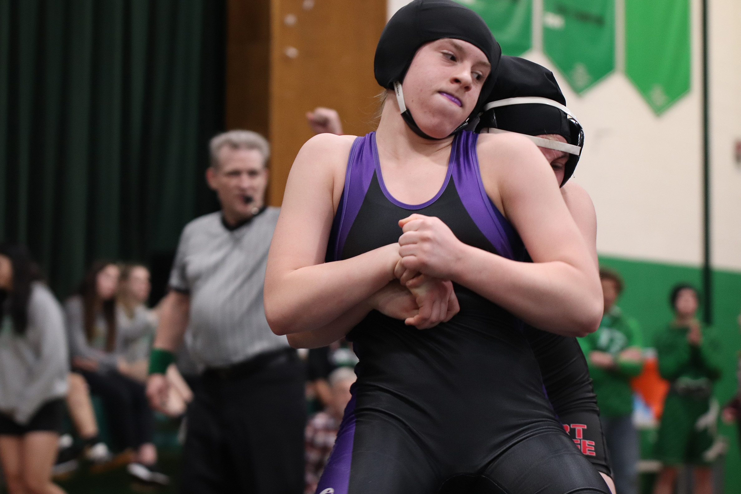 CODY THORN/Citizen photo Park Hill South’s Finley Bickford, front, tries to escape the grasp of Fort Osage’s Tess Kinne during the 136-pound championship match at the Class 1 District 4 meet on Saturday, Feb. 2 at Smithville High School. Bickford took second in the match and will be representing her school at the MSHSAA state championships starting on Feb. 14.