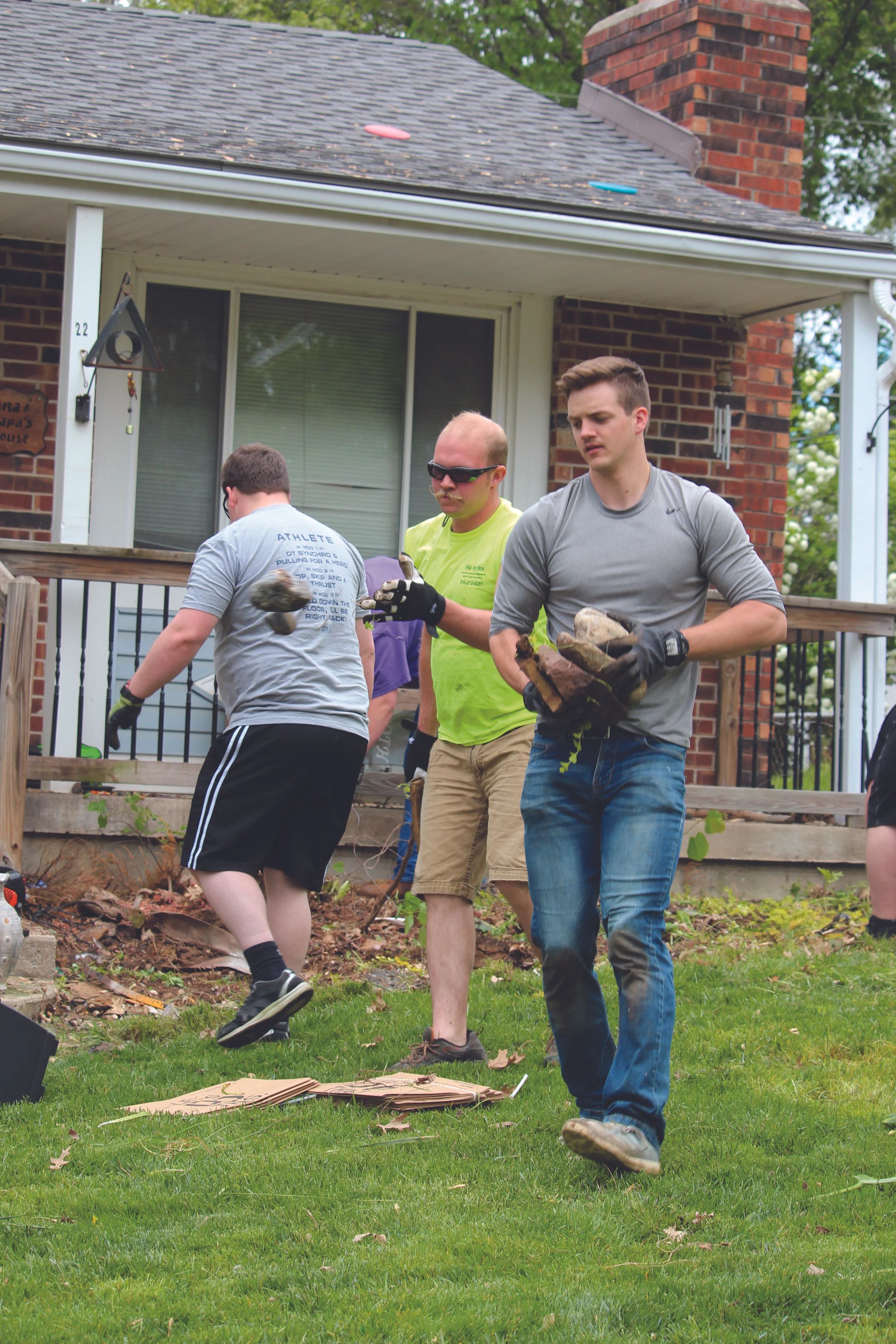 JEANETTE FAUBION/Citizen photo Firefighters from the Sni Valley Fire Protection District near Oak Grove, Mo. volunteered their time to redo the lawn of James Henderson in Platte City.