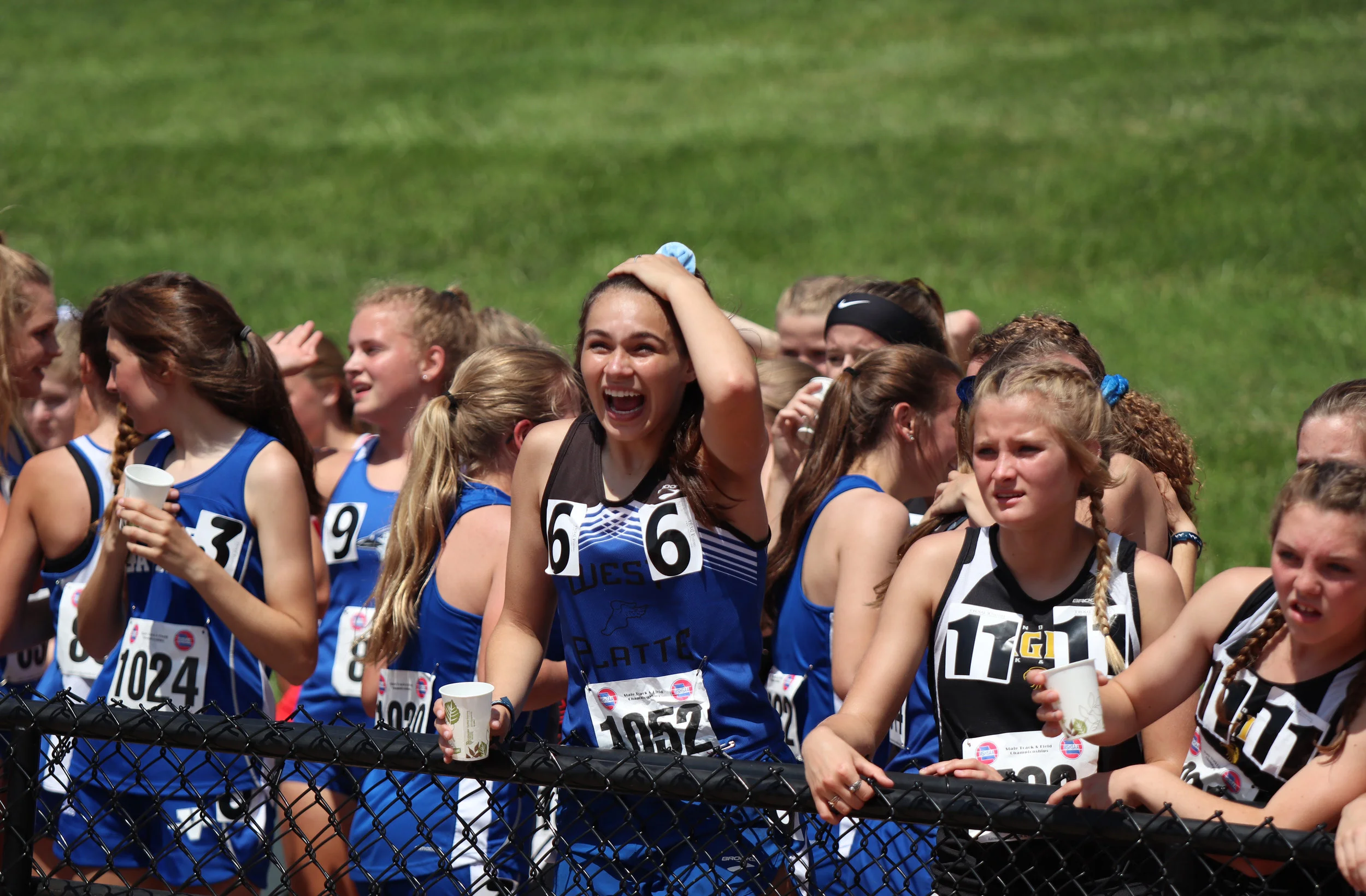 CODY THORN/Citizen photo West Platte’s Sophia Rush celebrates after teammate Lindsay Goodwin crossed the finish line in first place during the Class 2 4x800-meter relay championship race on Friday, May 17 in Jefferson City, Mo. The West Platte girls won a state title for the second year in a row.