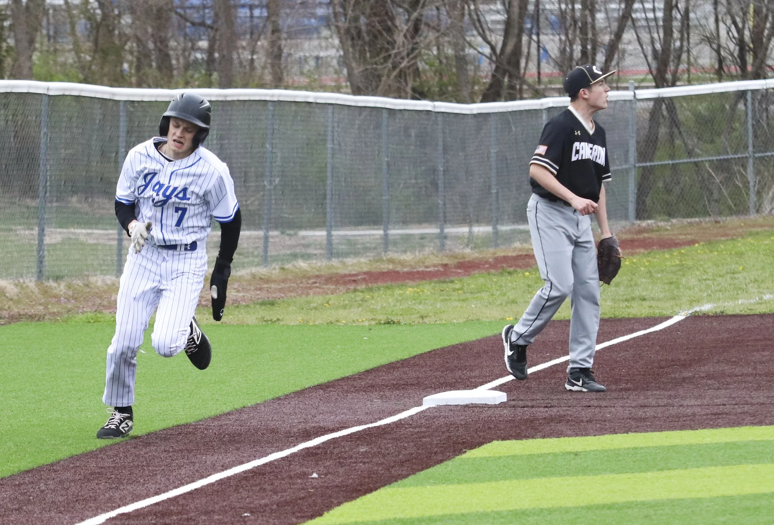 Gunner Smith rounding third.jpg