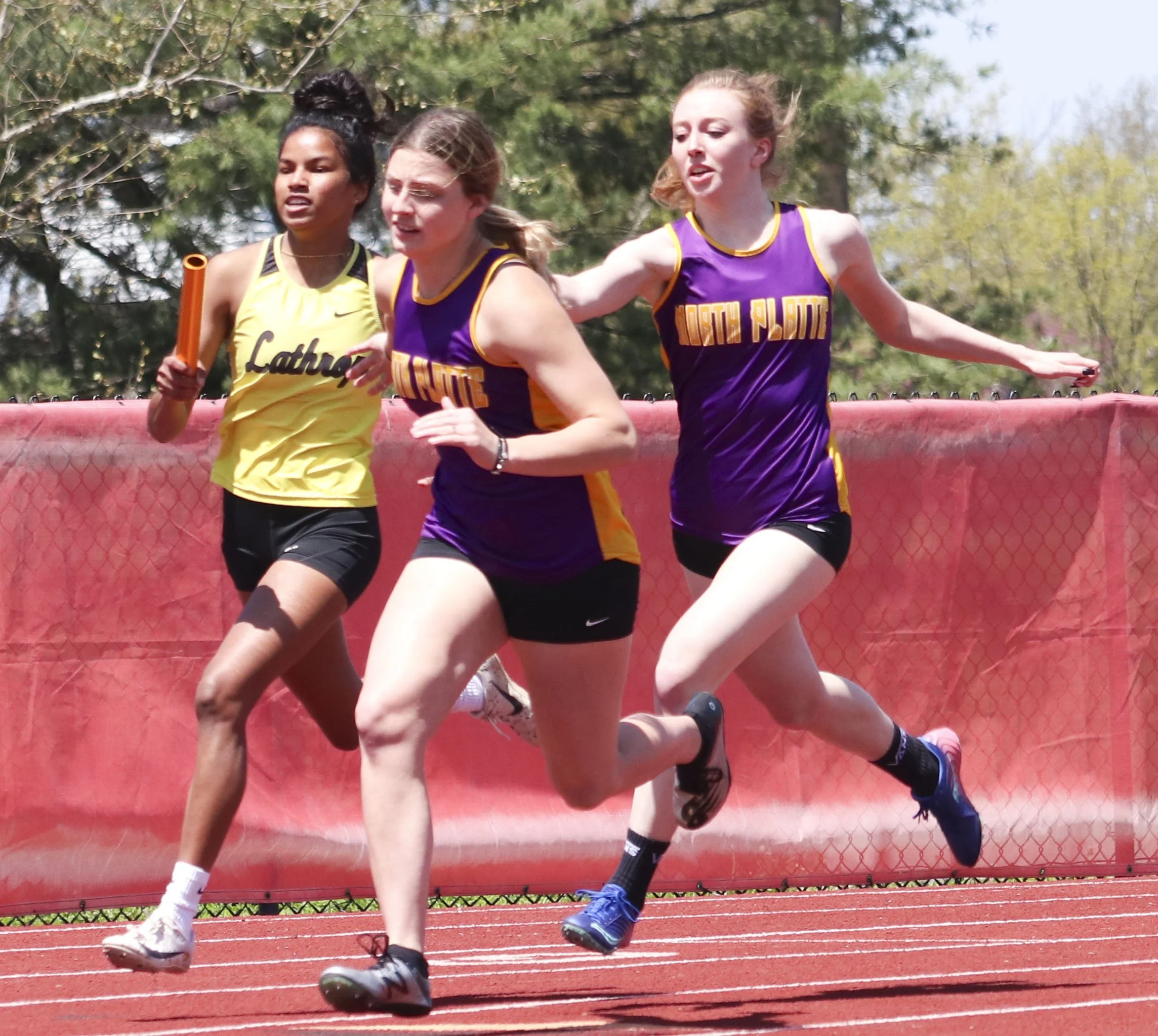 NP girls 4x200 handoff.jpg