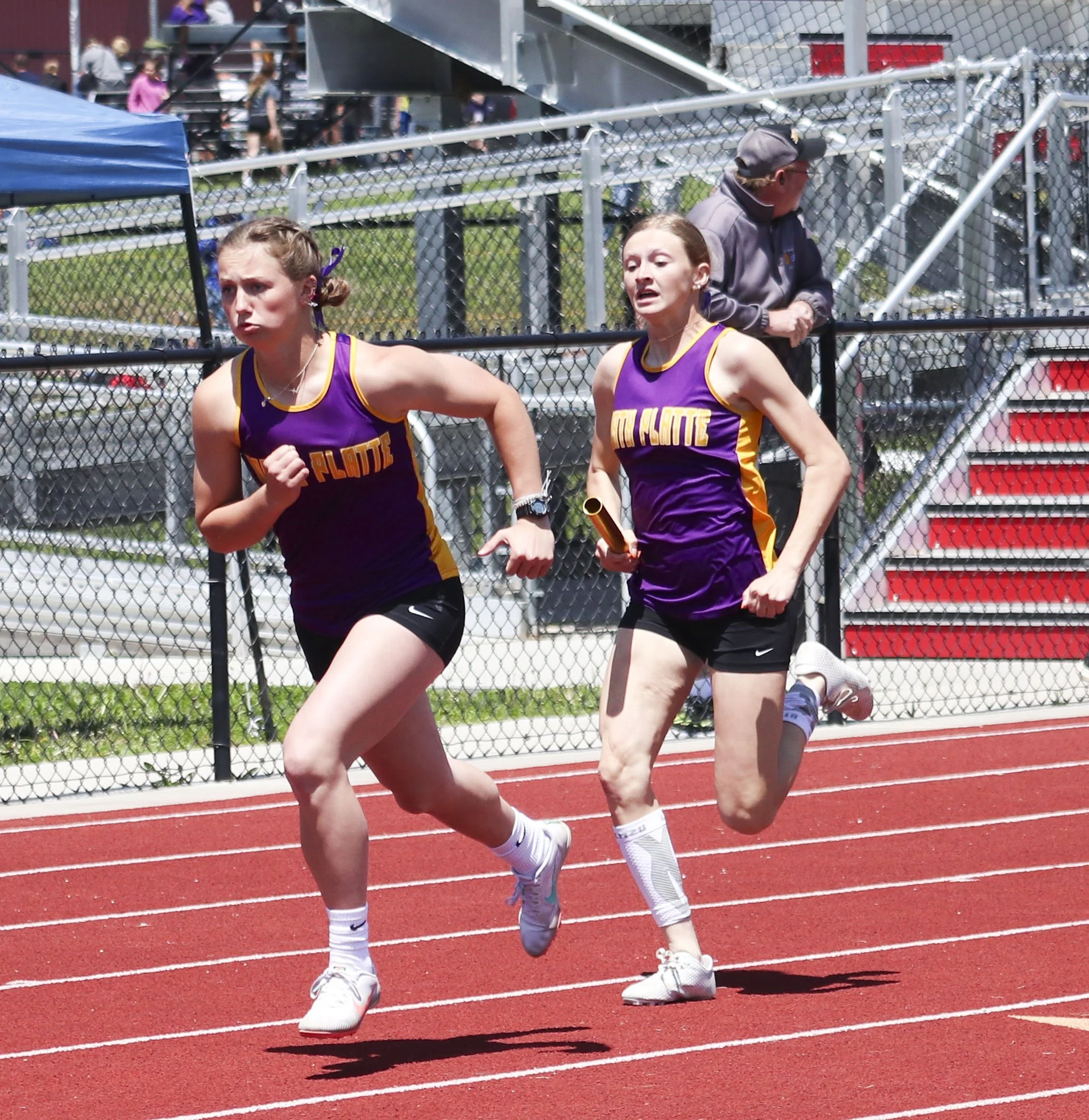 NP girls second 4x200 handoff.jpg