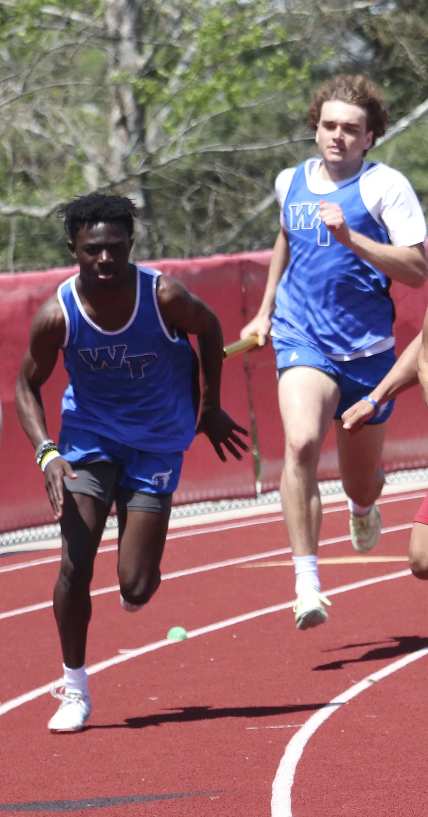 Wp boys 4x200 handoff.jpg