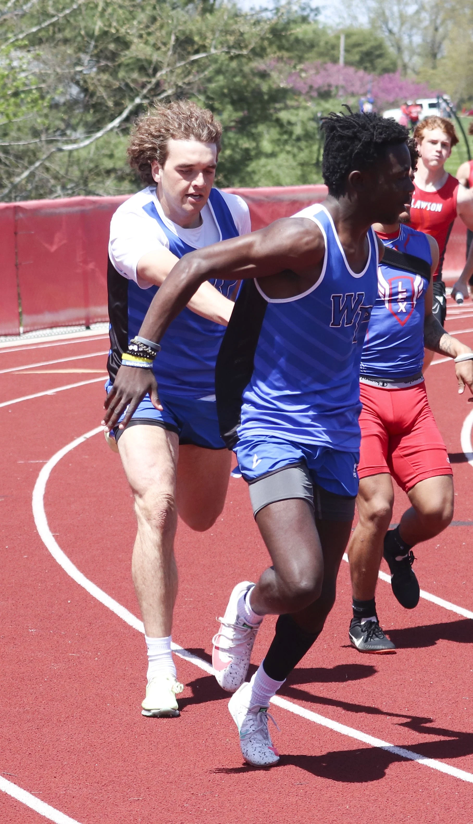 Wp boys 4x200 handoff_1.jpg