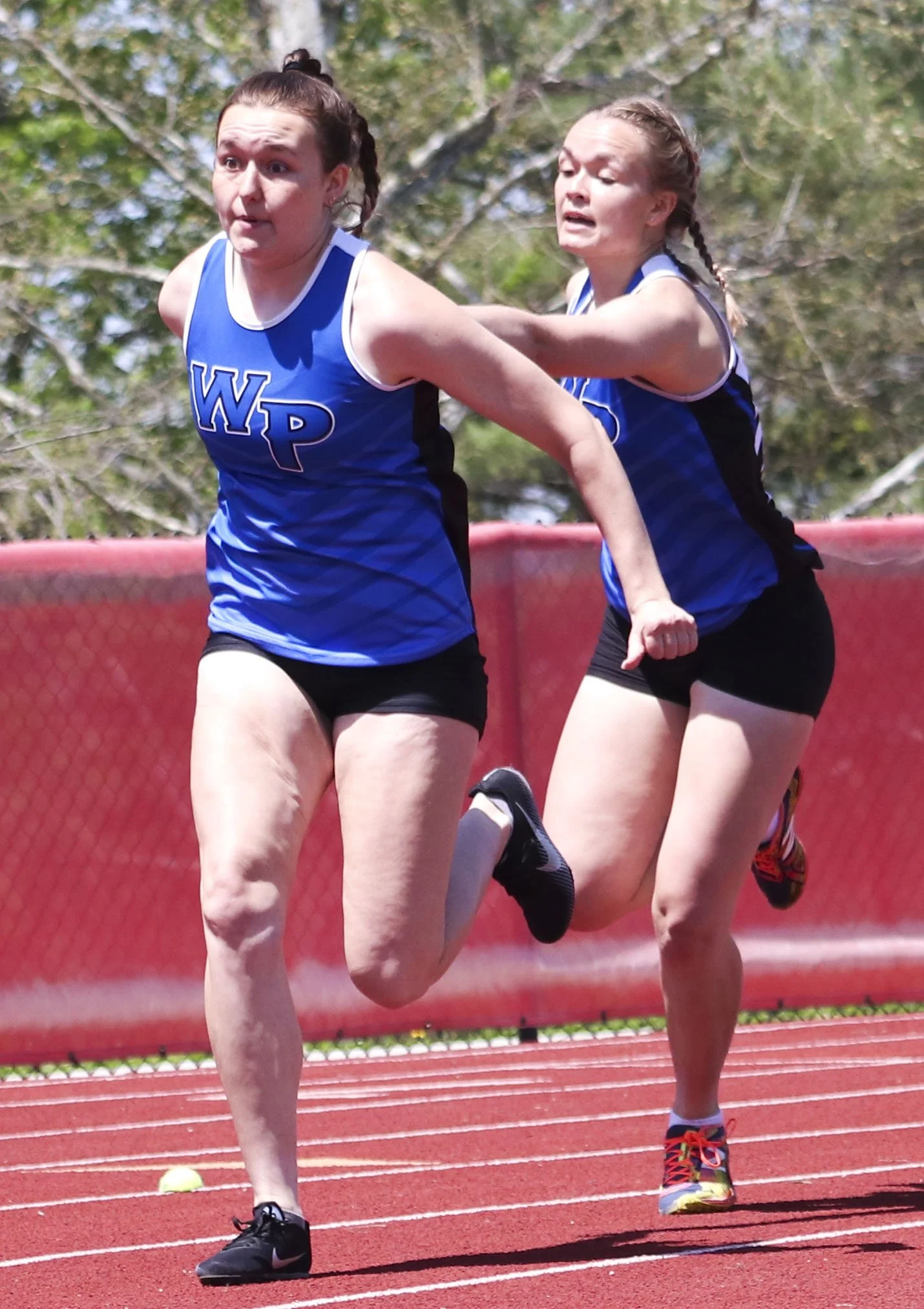 WP girls 4x200 handoff_1.jpg