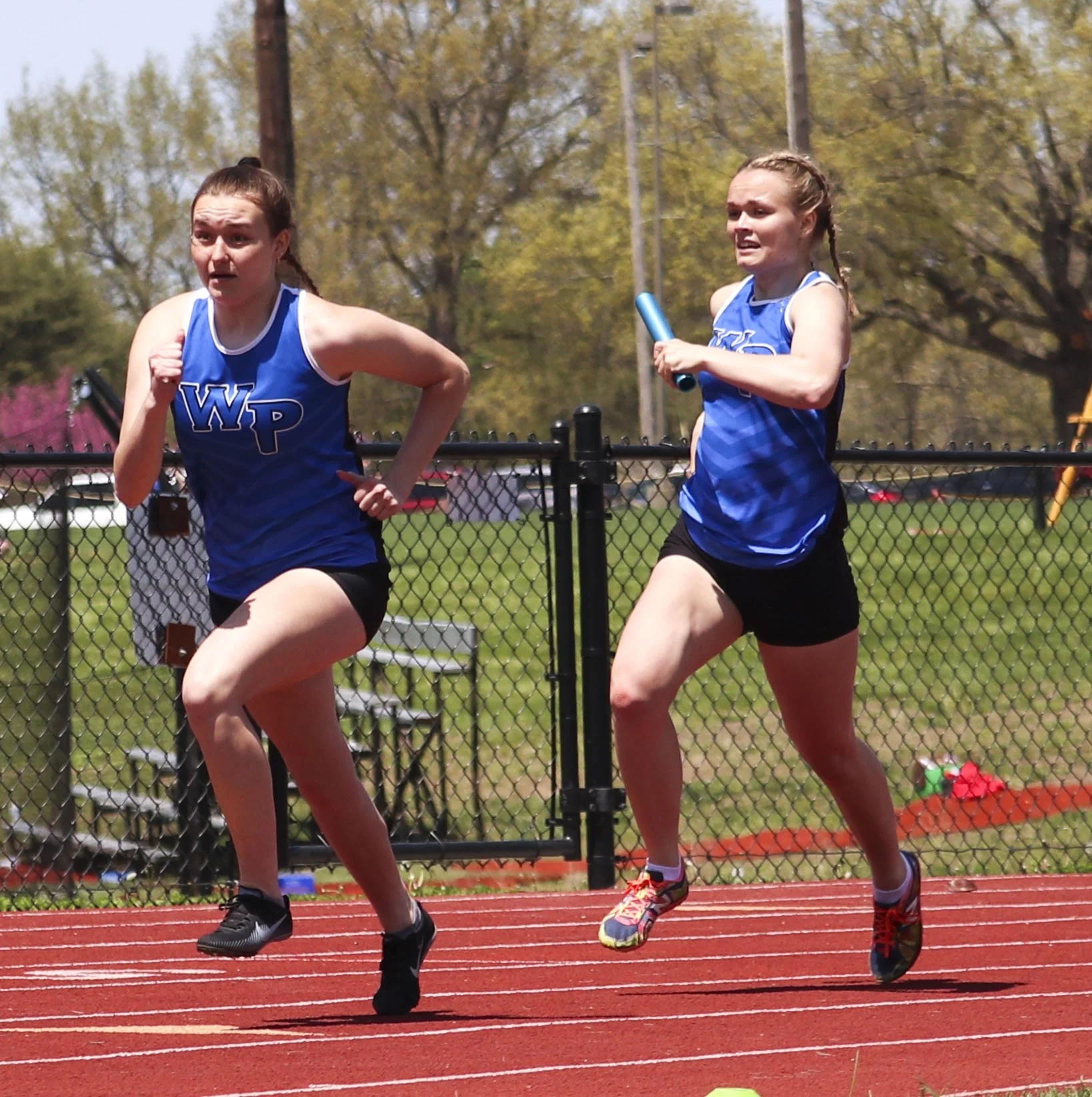 WP girls 4x200 handoff.jpg