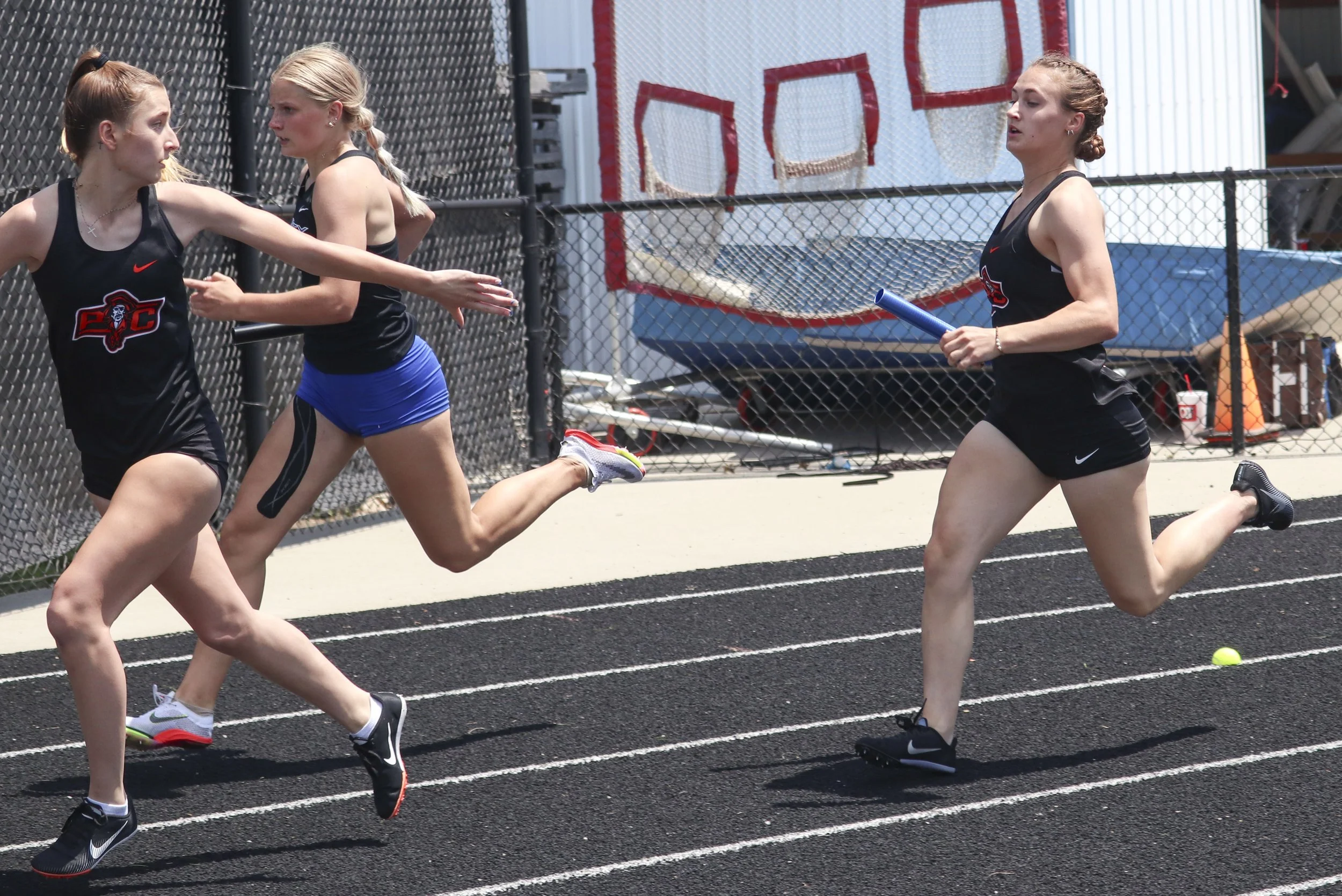 PC girls 4x200 1st leg to 2nd.jpg