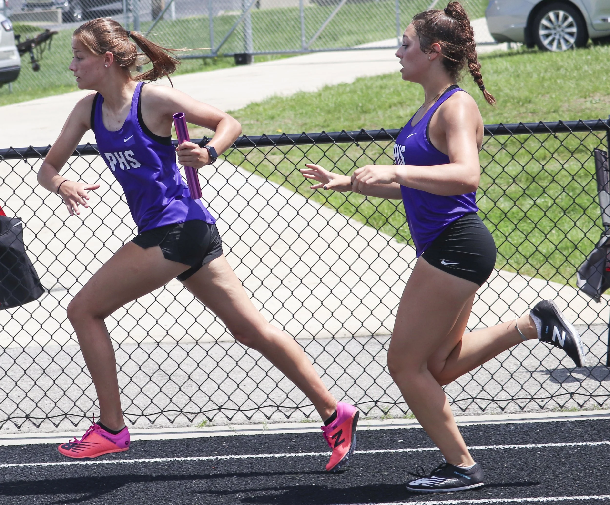 PHS girls 4x200 3rd leg to 4th_1.jpg