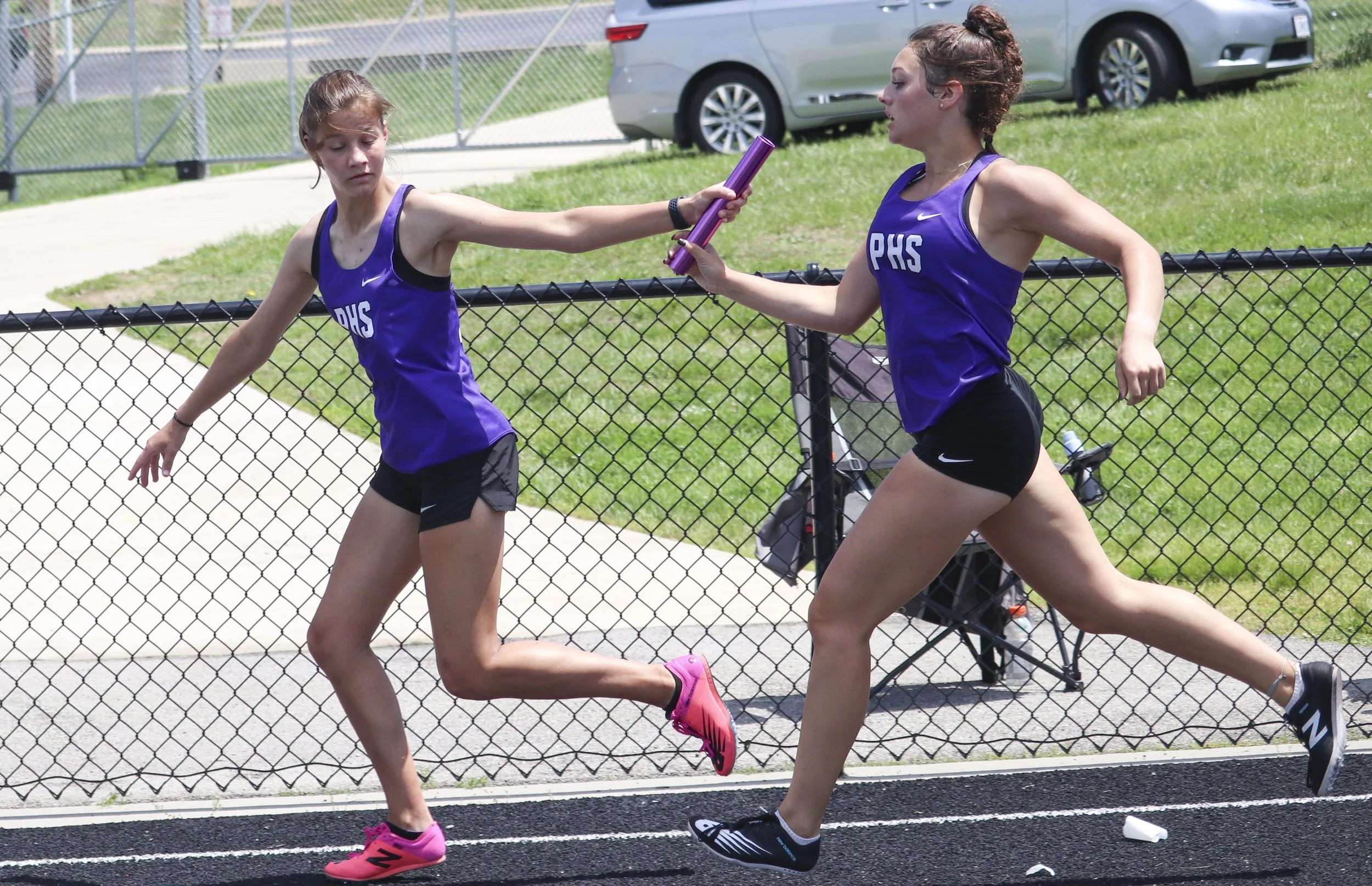 PHS girls 4x200 3rd leg to 4th.jpg
