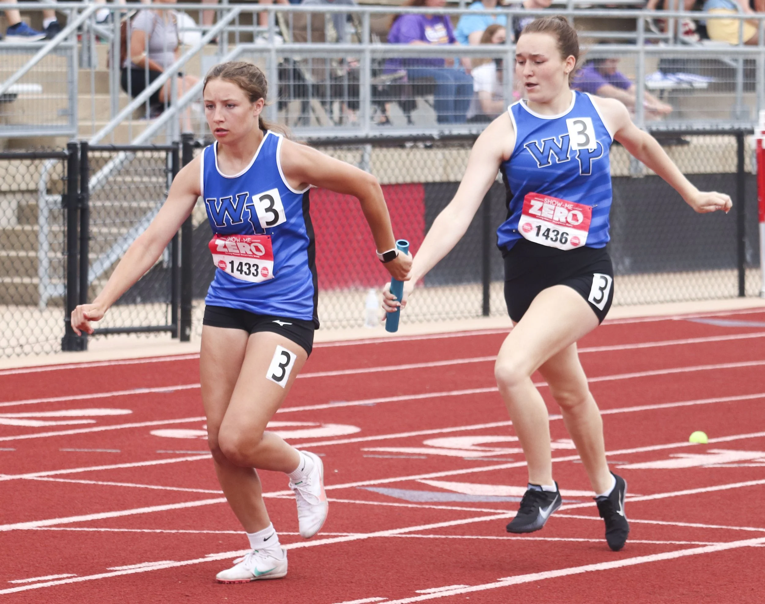 WP girls 4x200 prelim handoff_1.jpg