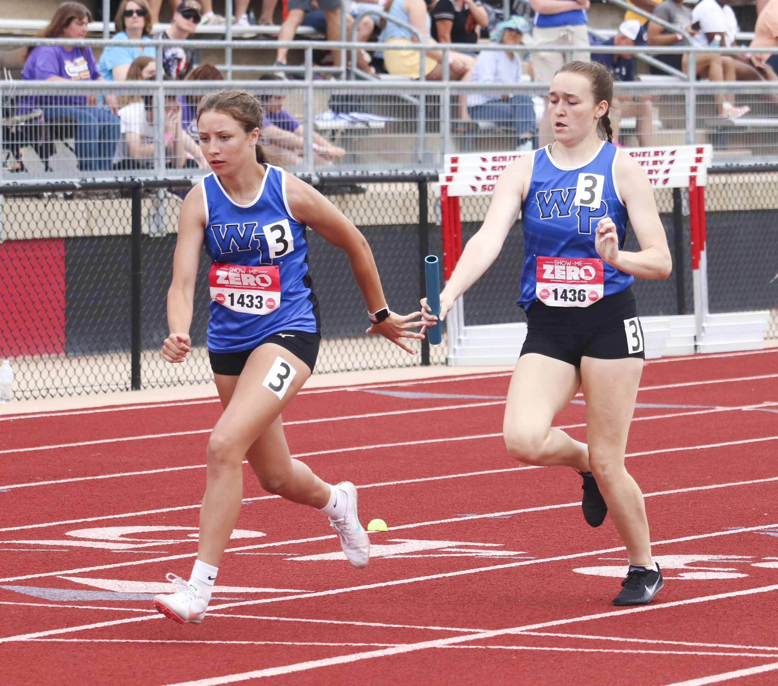 WP girls 4x200 prelim handoff.jpg