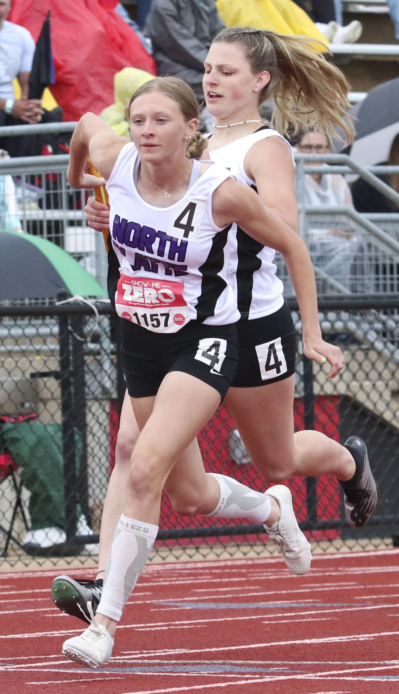 Girls 4x200 finals handoff NP_1.jpg