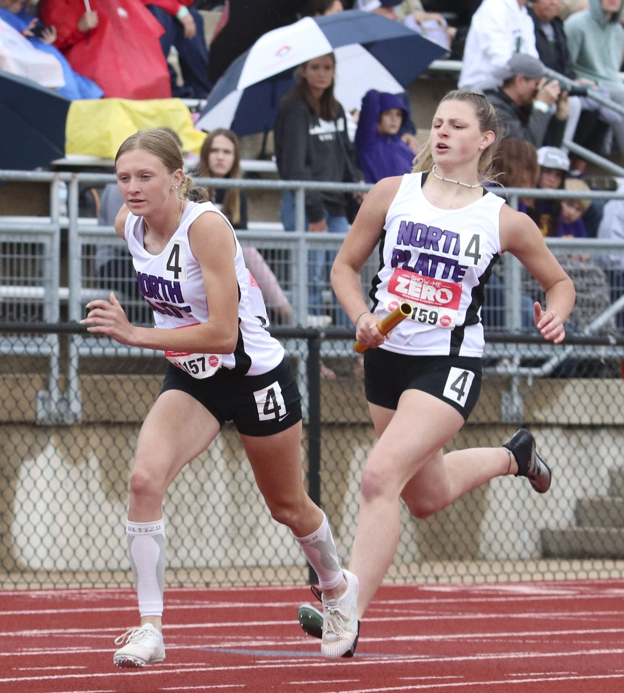 Girls 4x200 finals handoff NP.jpg