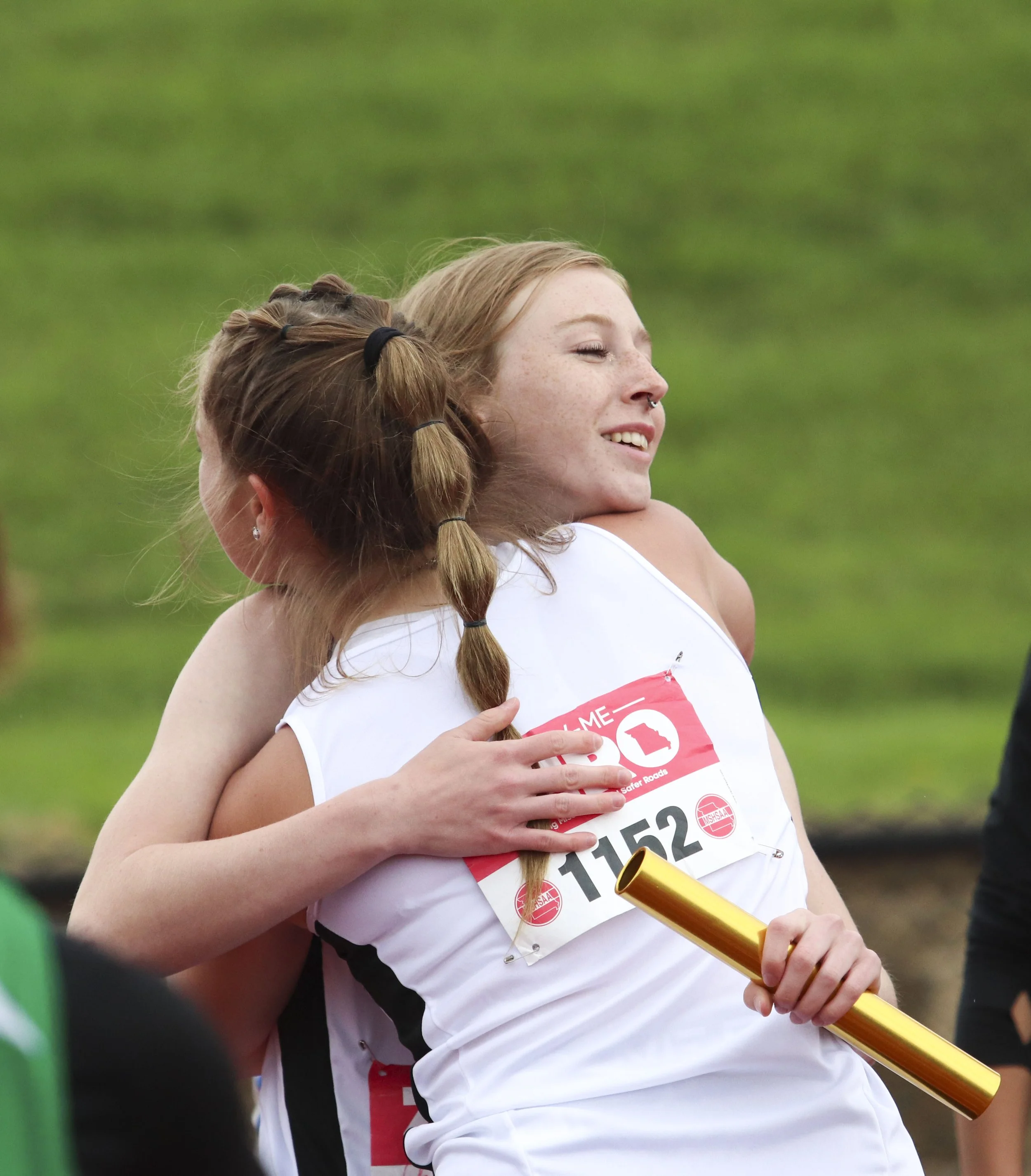 NP girls 4x100 hug.jpg
