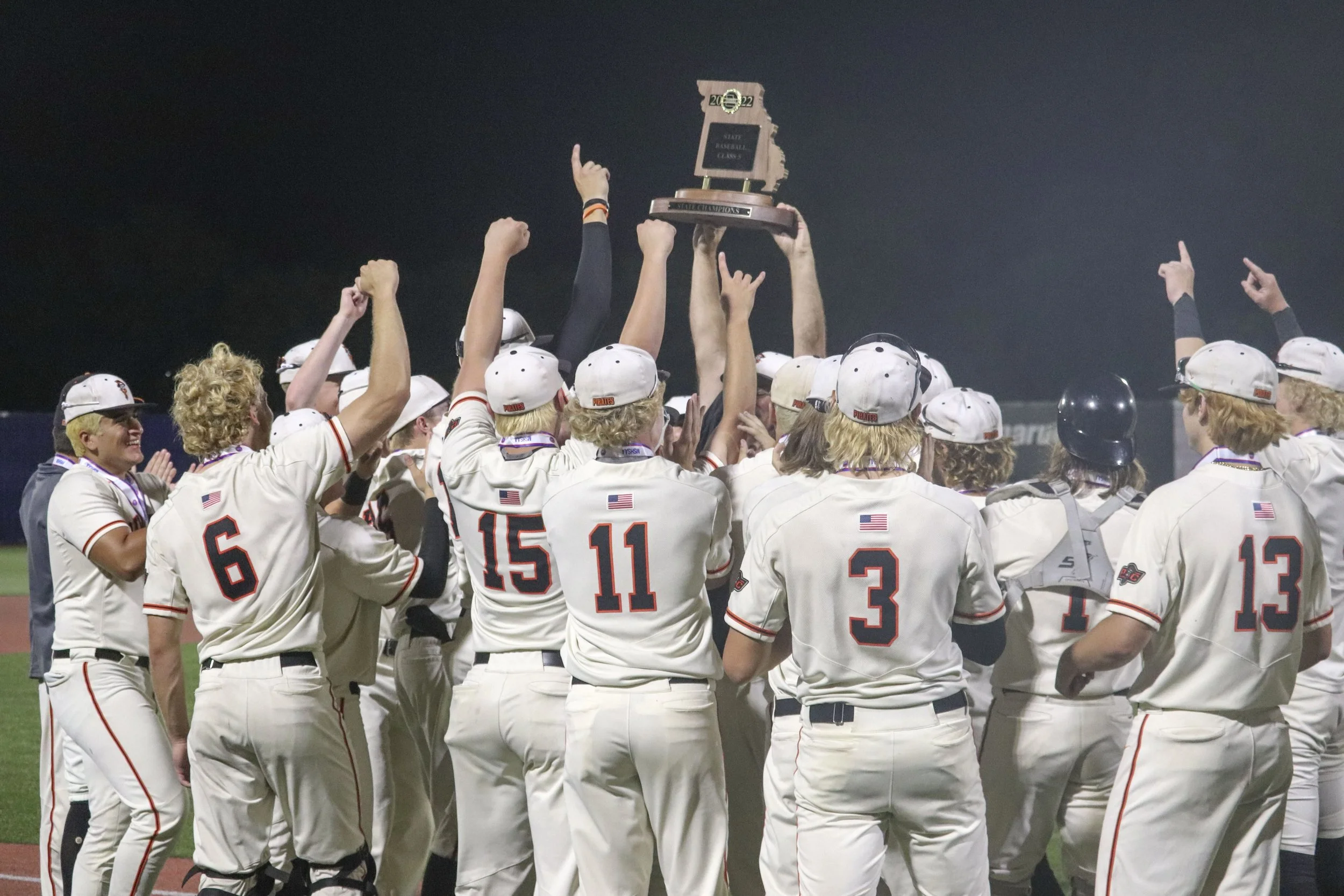 POST - Team pic with trophy lifted.jpg