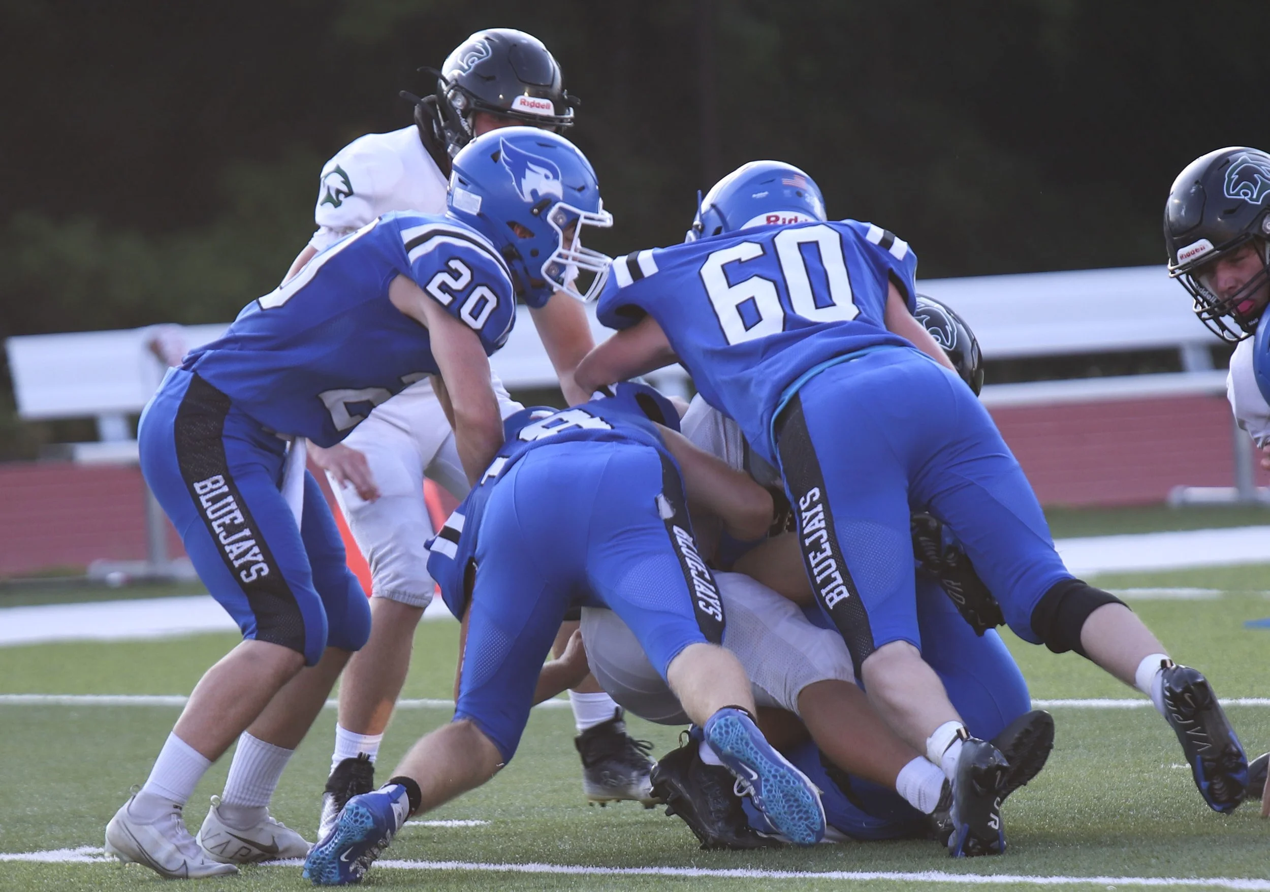 Christian Larrabee_Peyson Chandler_Josh Brown tackle_1.jpg