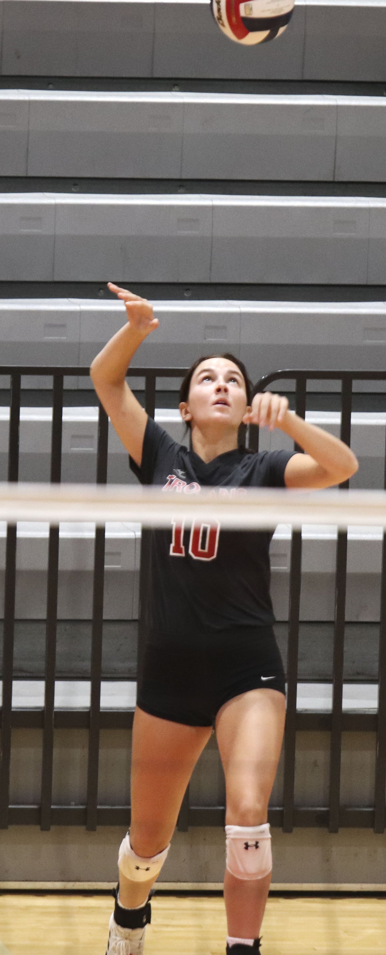 Emily Pella serve.jpg