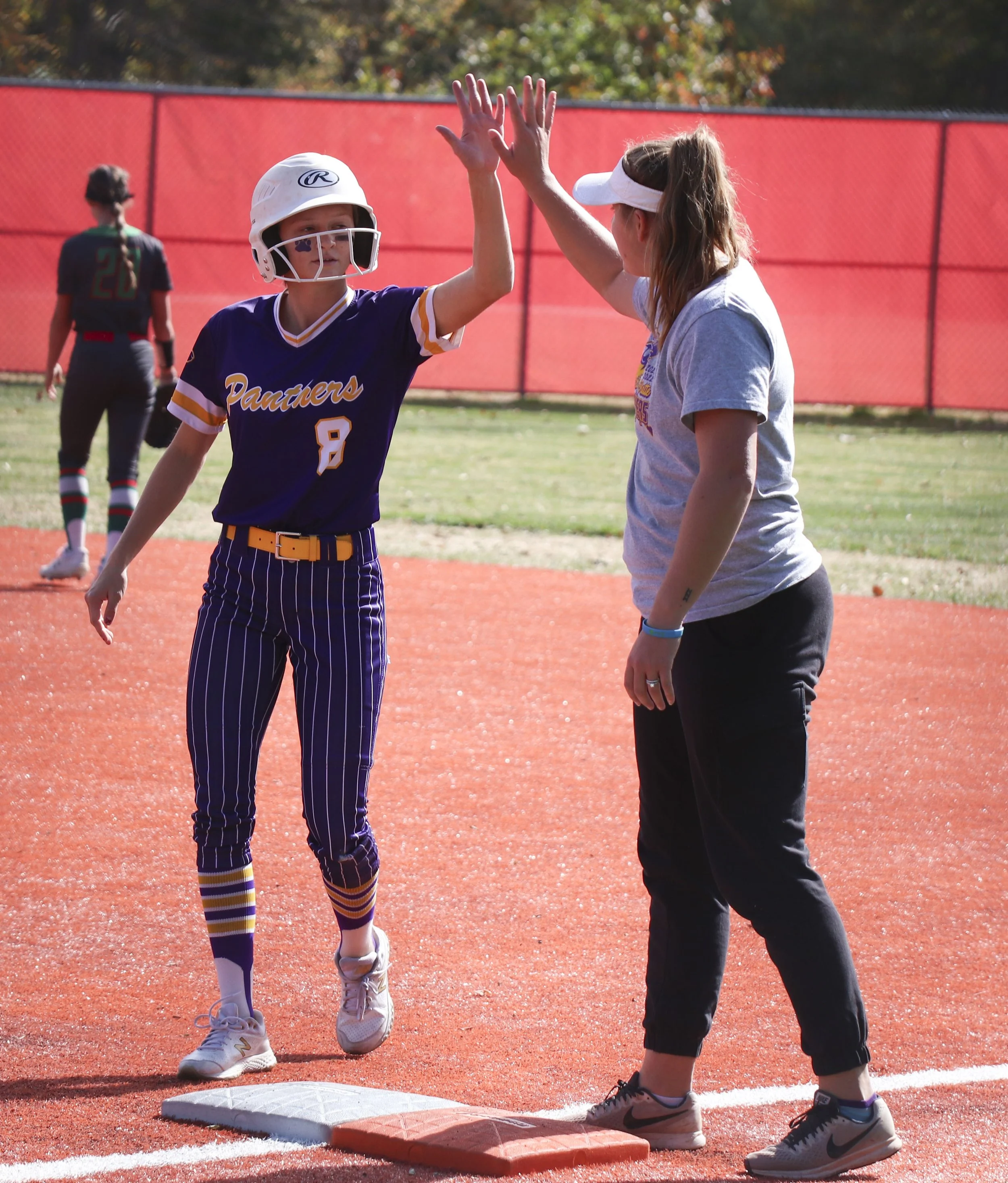 Olivia ROgers high 5.jpg