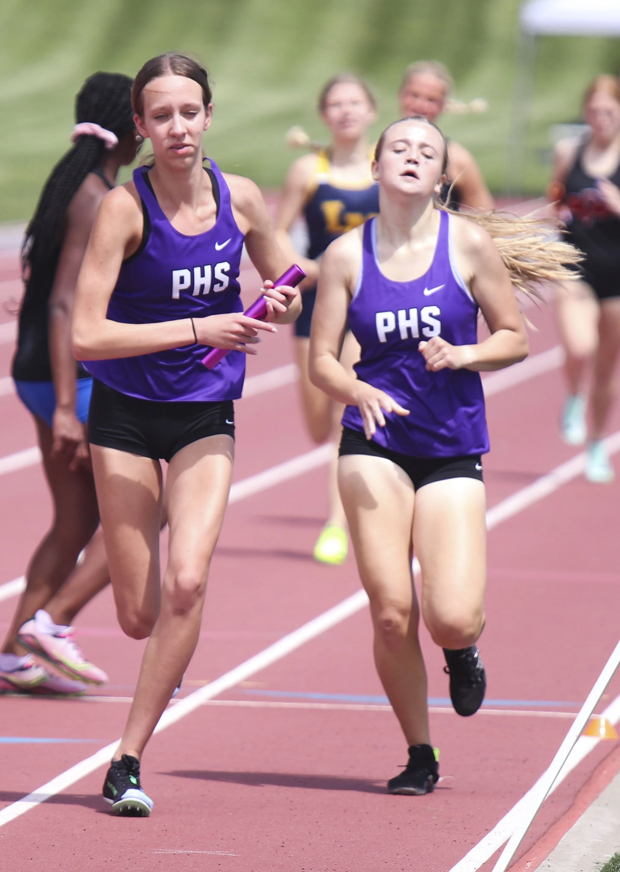 Girls 4x800 Ella Conklin handoff to 3_1.jpg