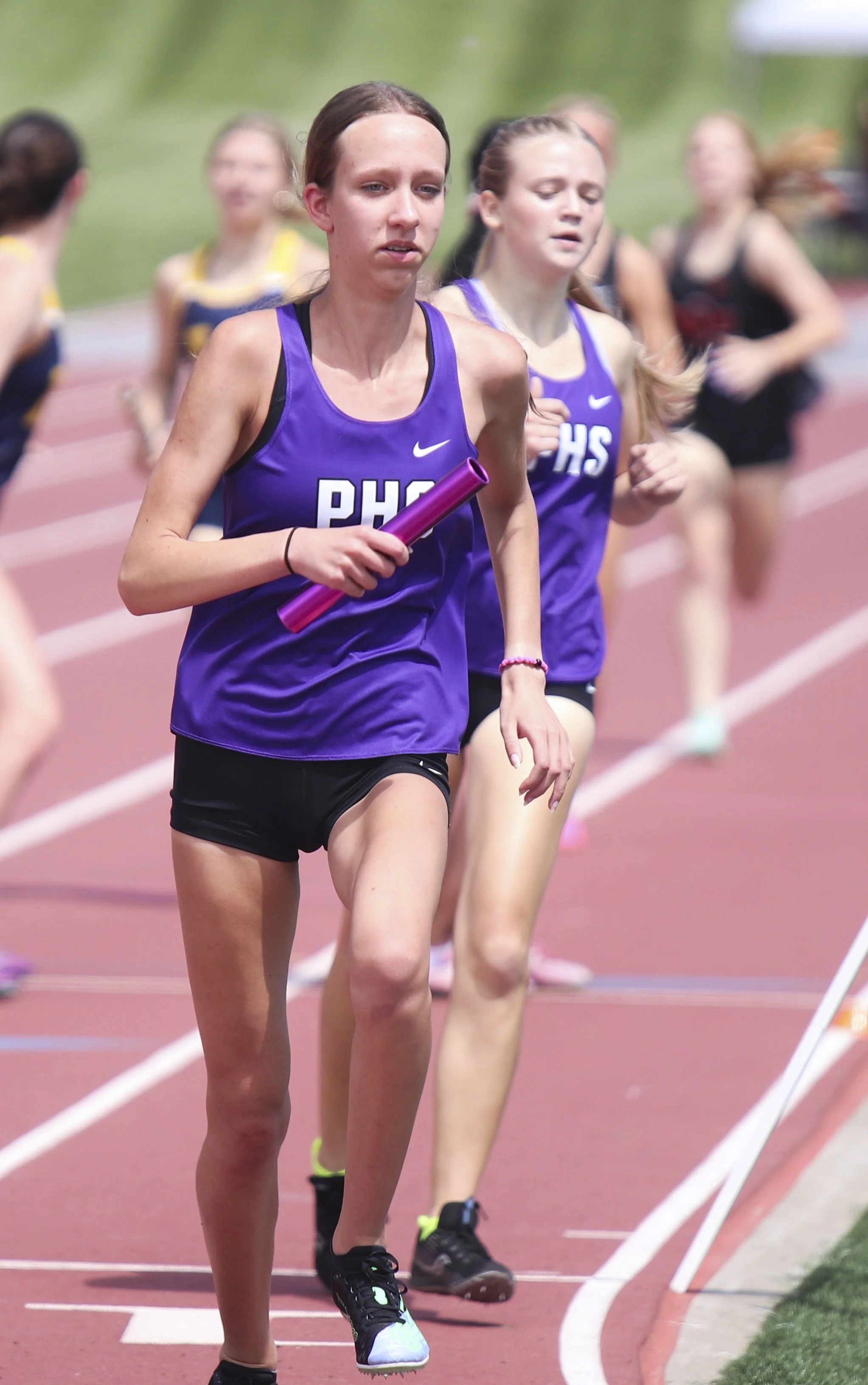 Girls 4x800 Ella Conklin handoff to 3_2.jpg