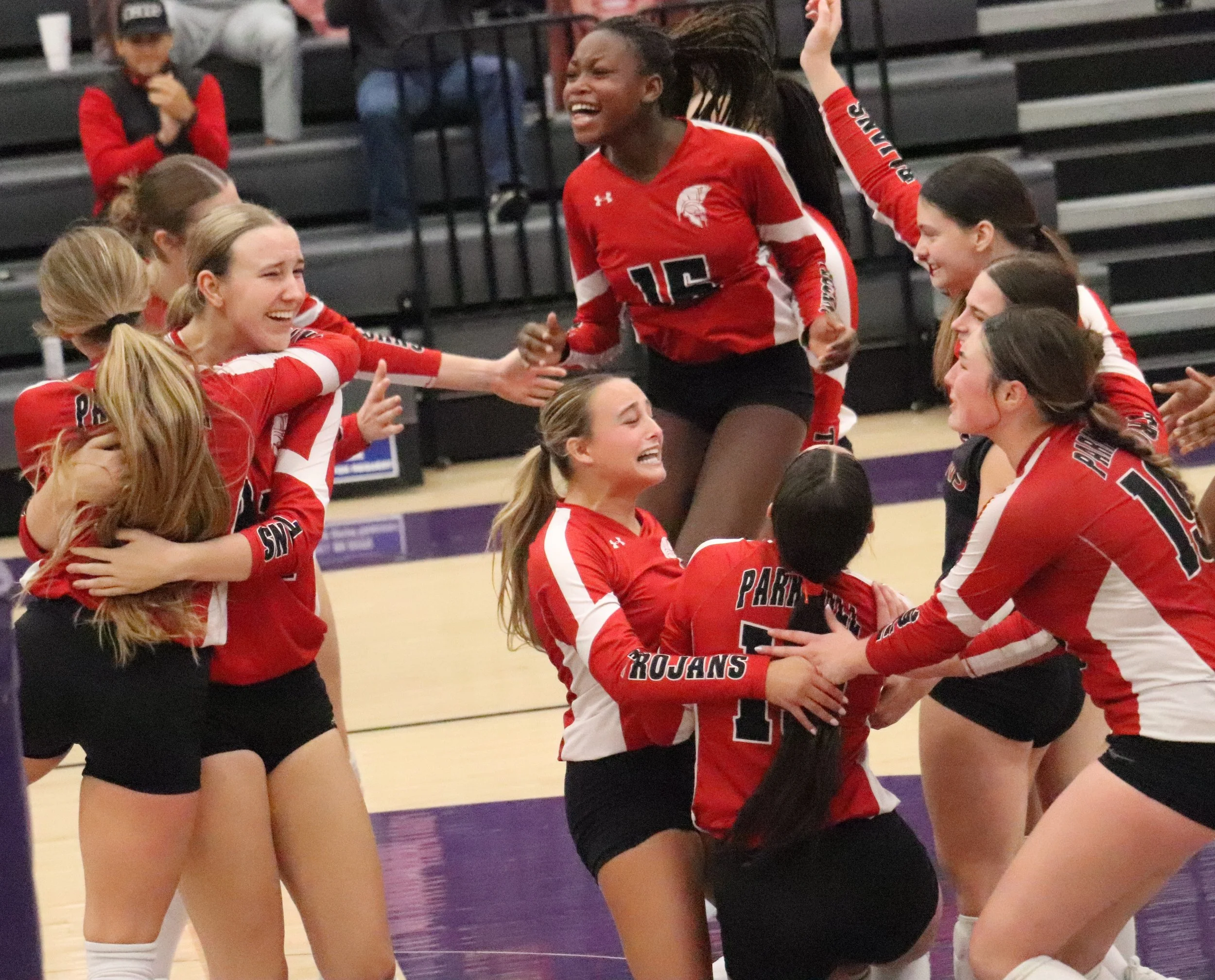 Trojans revive late for spot in district finals