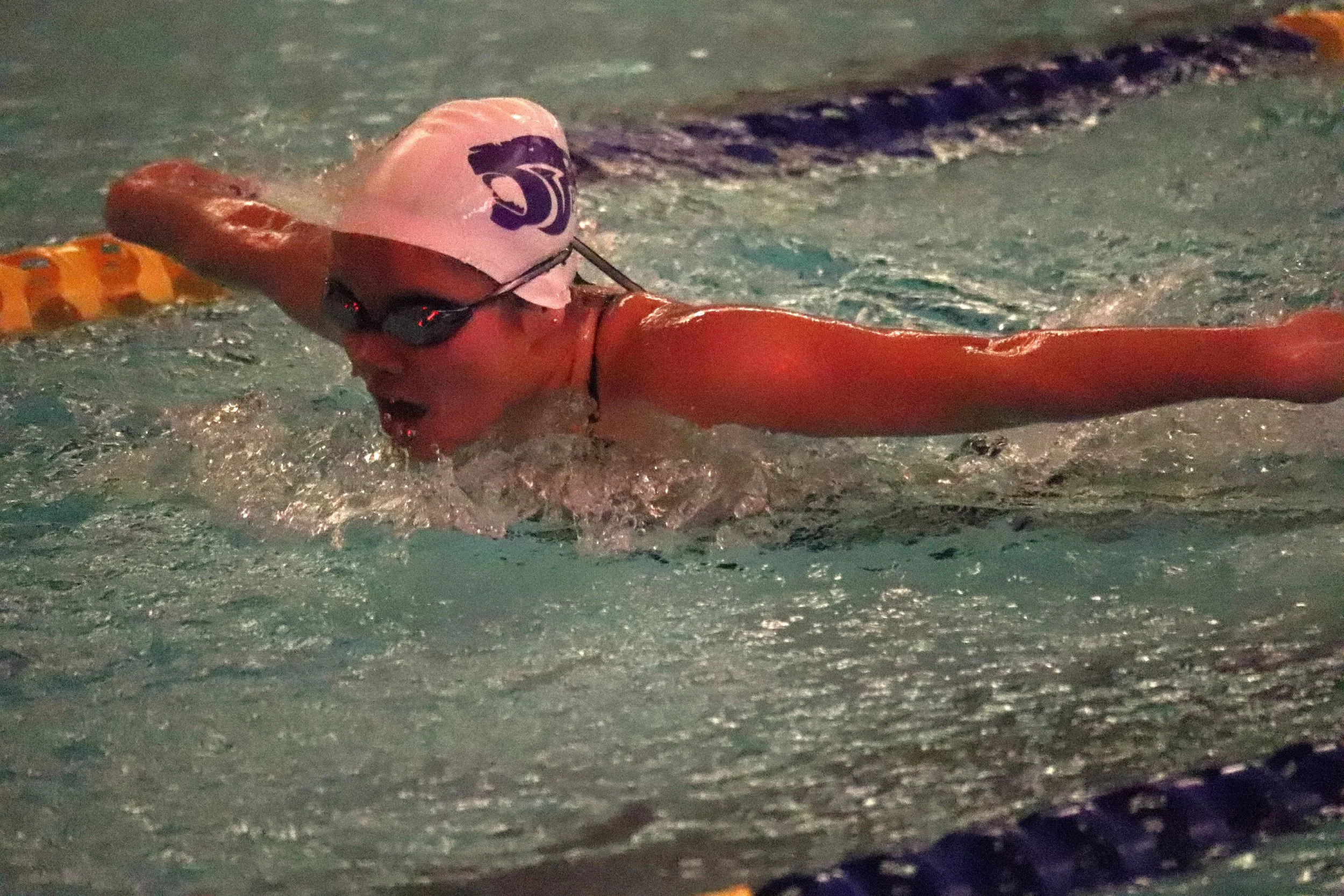 Panthers, Trojans open  girls swim season