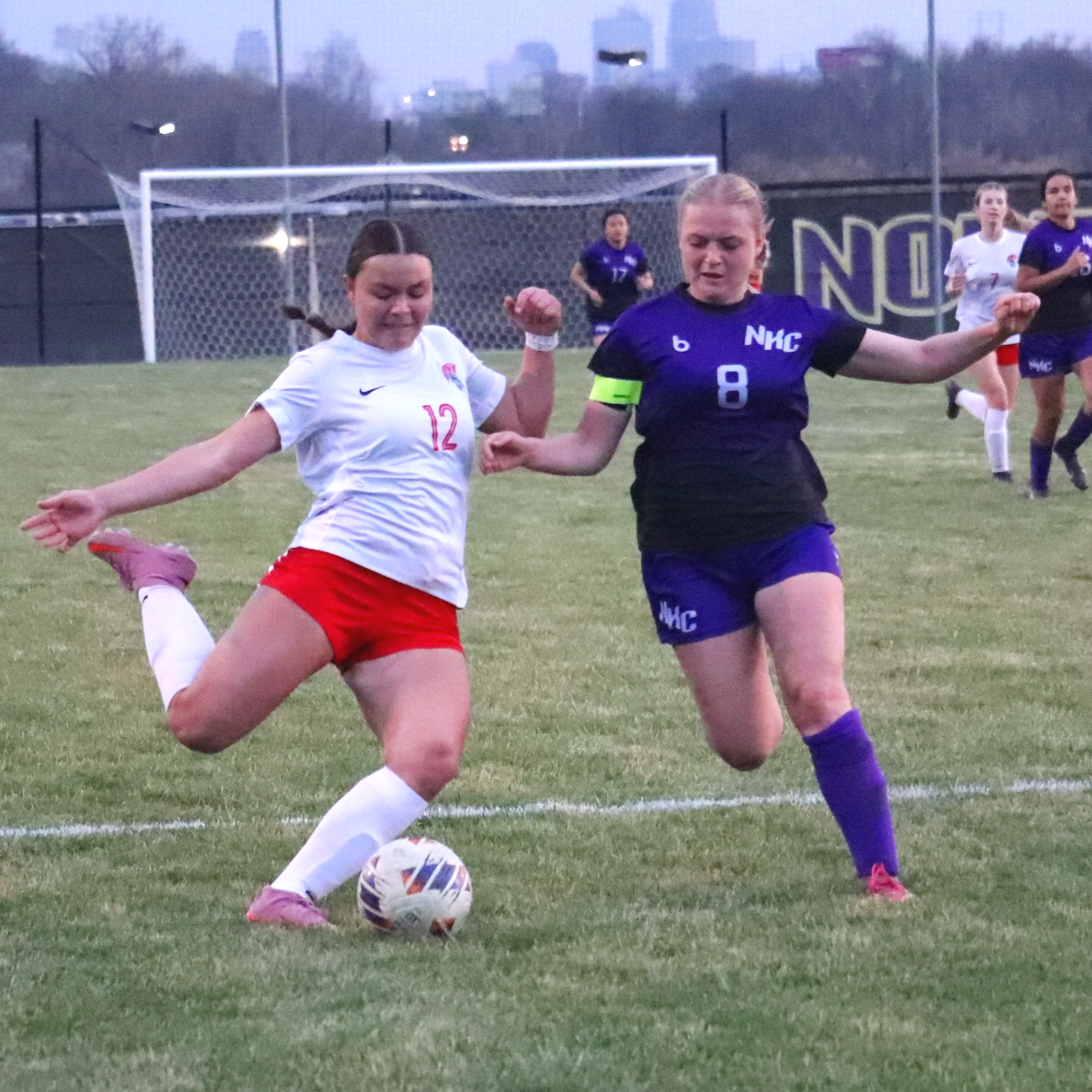 Trojans girls overcome tricky conditions in defeat of Hornets