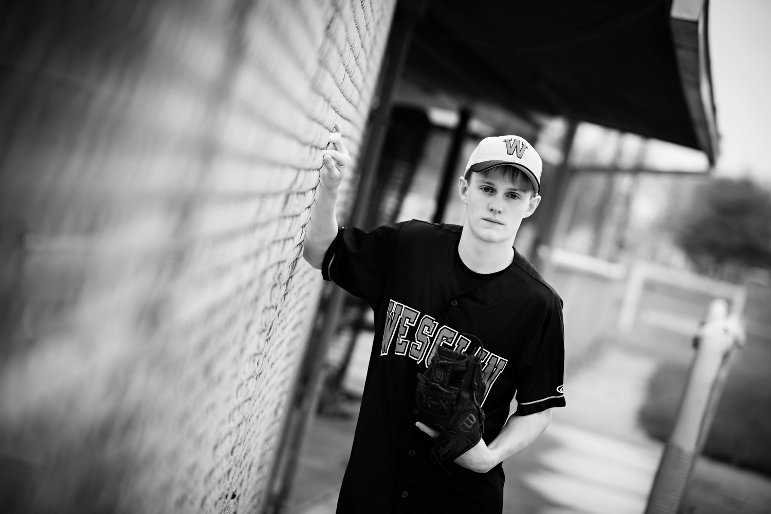 black and white baseball senior portraits hillary frost.jpg