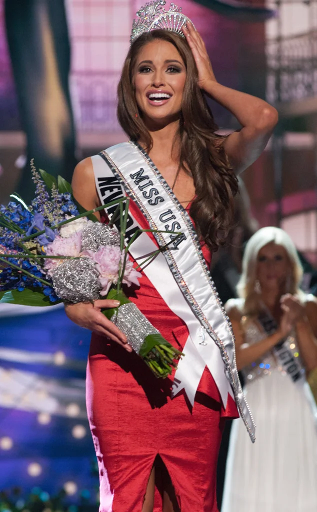 Nia Sanchez, Miss USA 2014, being crowned in red