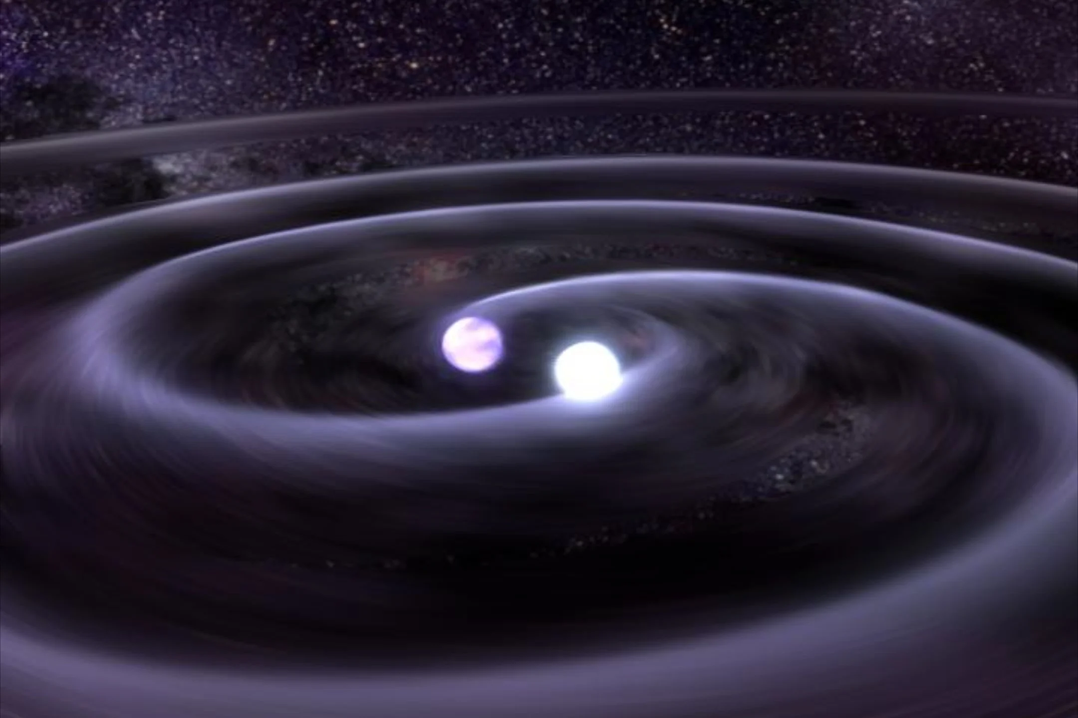 Illustration showing white dwarf stars creating gravity waves as they spiral inward. PHOTO CREDIT: NASA
