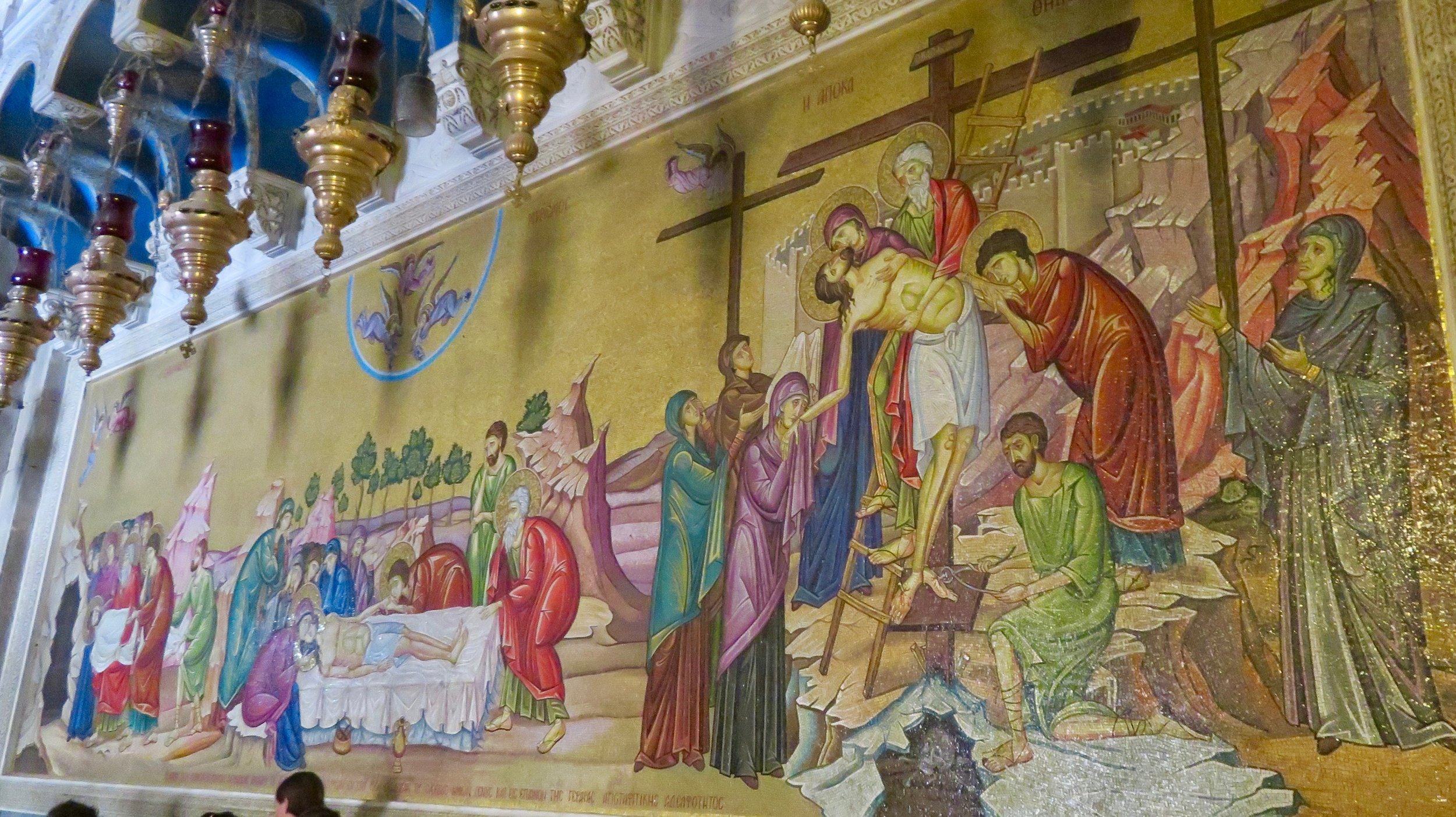 Mosaic depicting the crucifixion and burial of Jesus in the Church of the Holy Sepulchre.