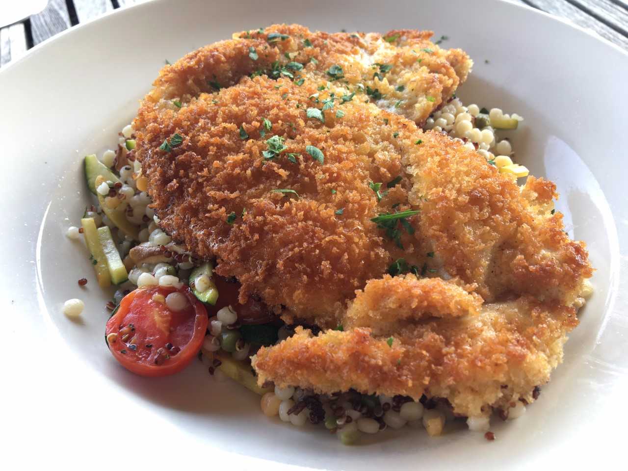 Chicken Paillard - double chicken breast flattened & fried or pan-seared. Served over mixed vegetable basil cous cous. "A fresh take on an old favorite with a light side you don't have to feel guilty about."