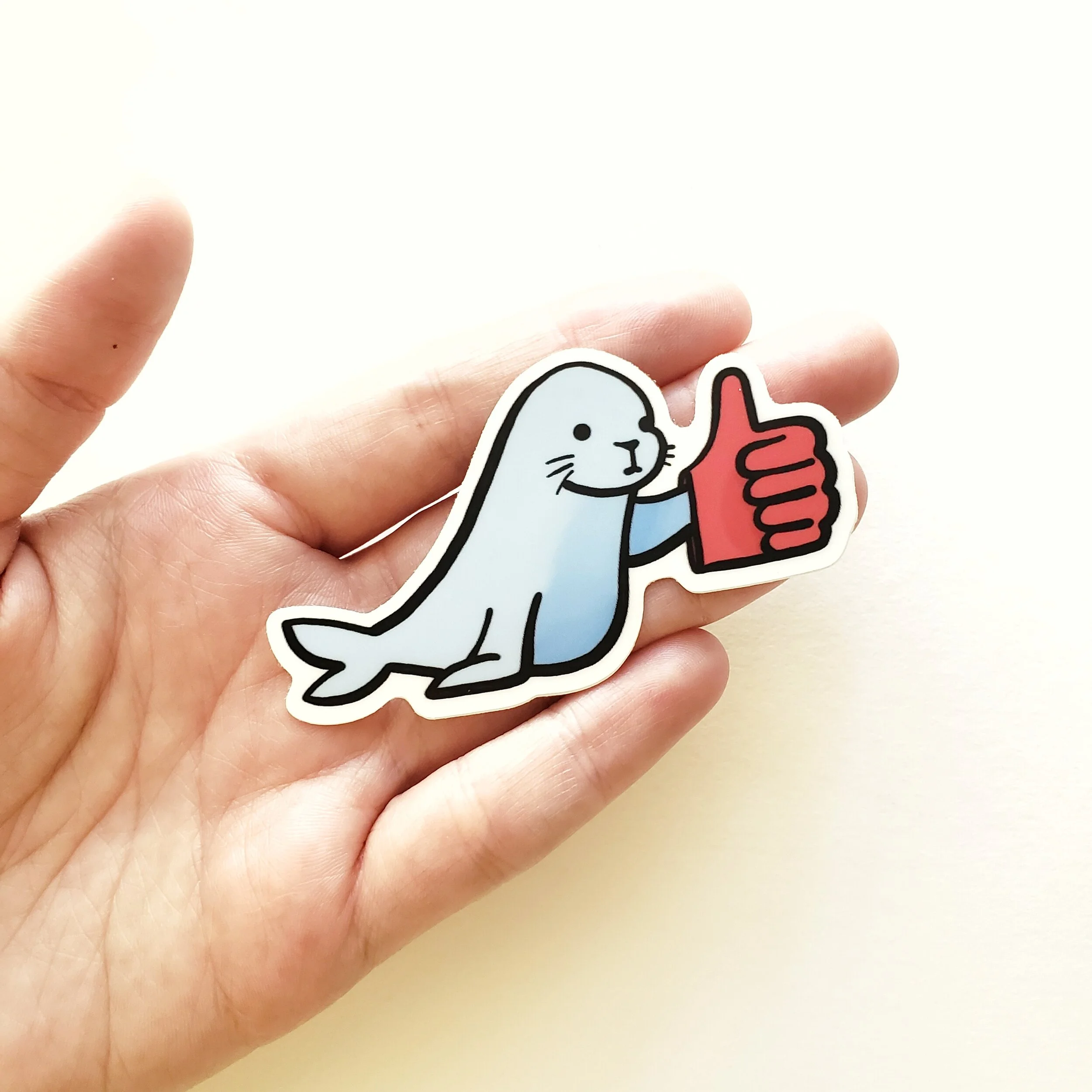 seal stkr-hand.jpeg