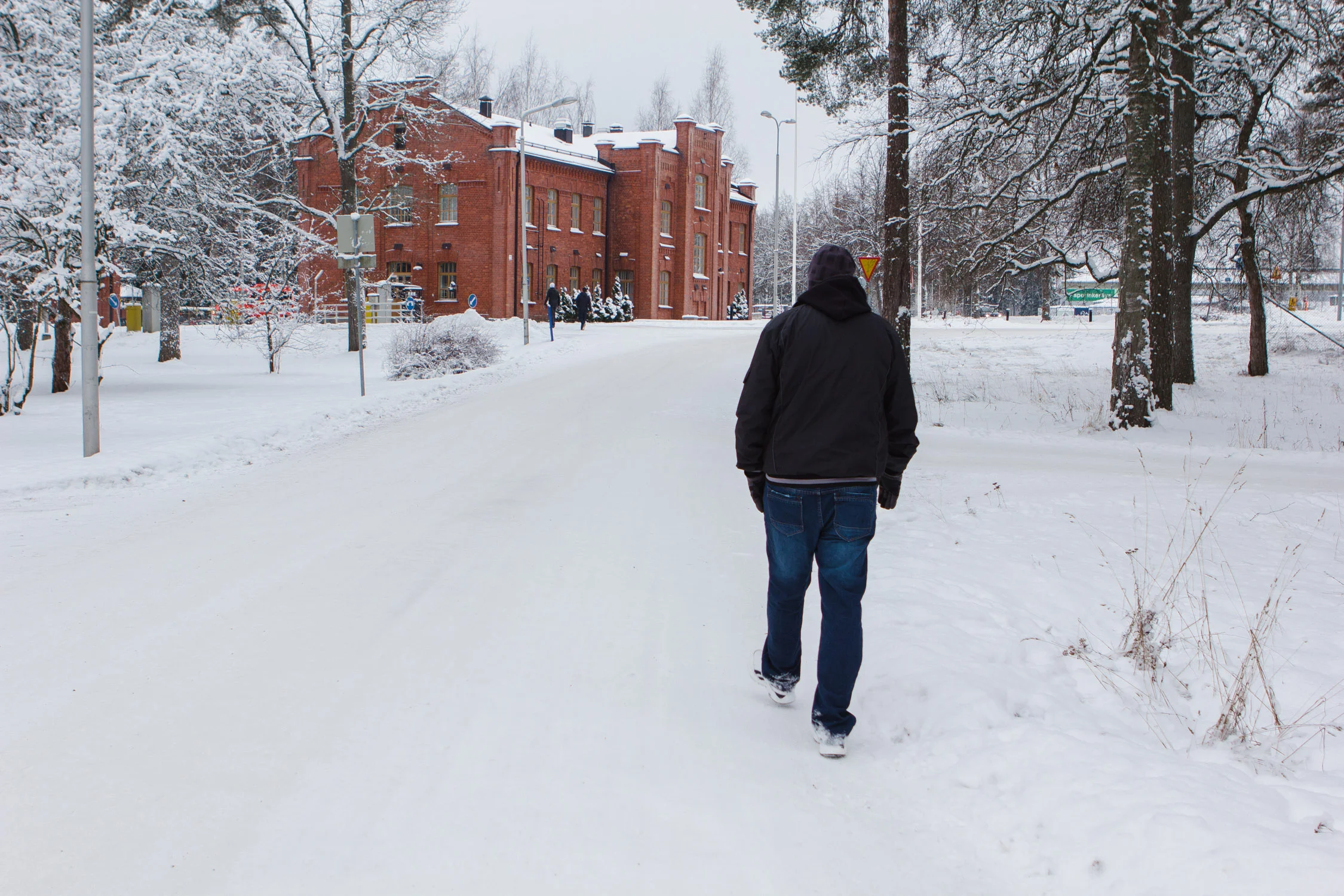 J. walks back to the home after our interview. (February 2016)
