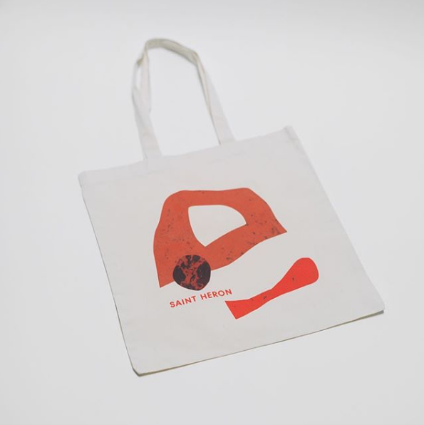 Saint Heron Tote Bags