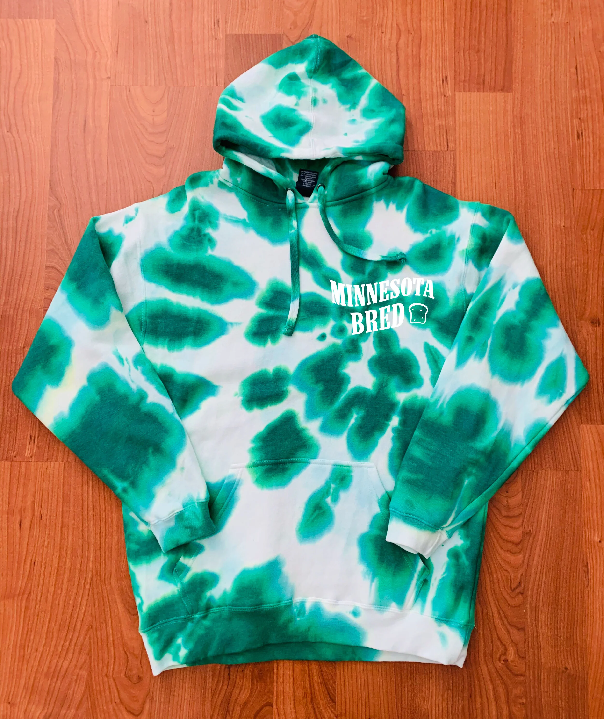 green tie dye sweatshirt