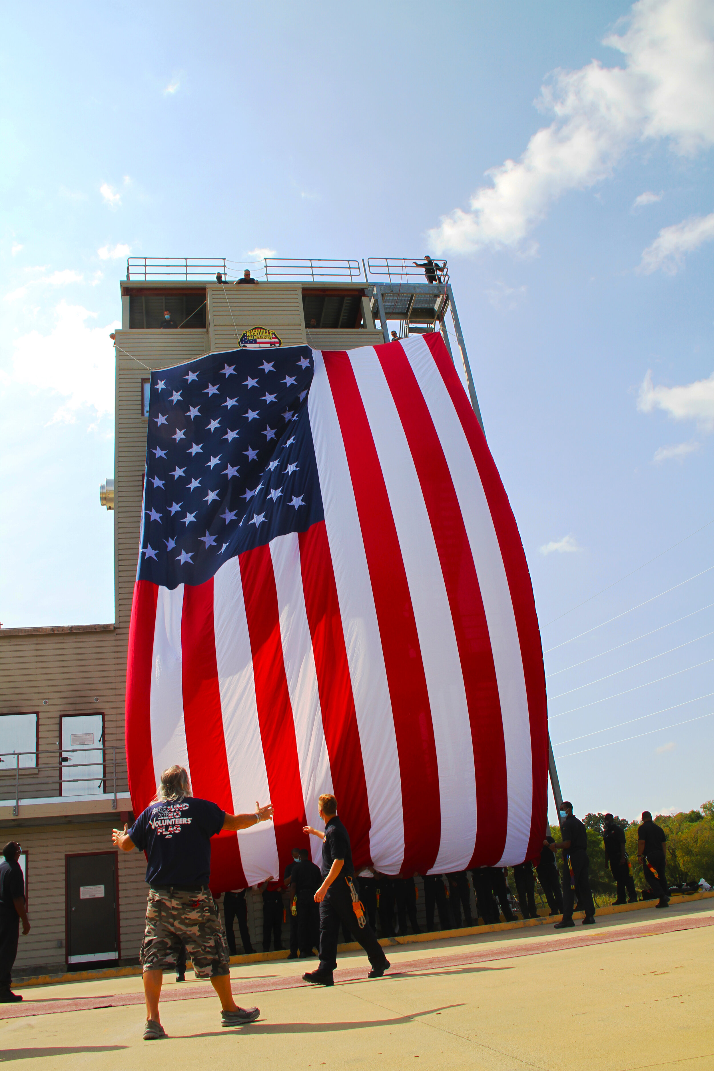  2020 9/11 Tribute Nashville Fire Department Training Grounds – GROUND ZERO VOLUNTEERS FLAG 2020 – Photo: Cierra Mazzola – All Rights Reserved 