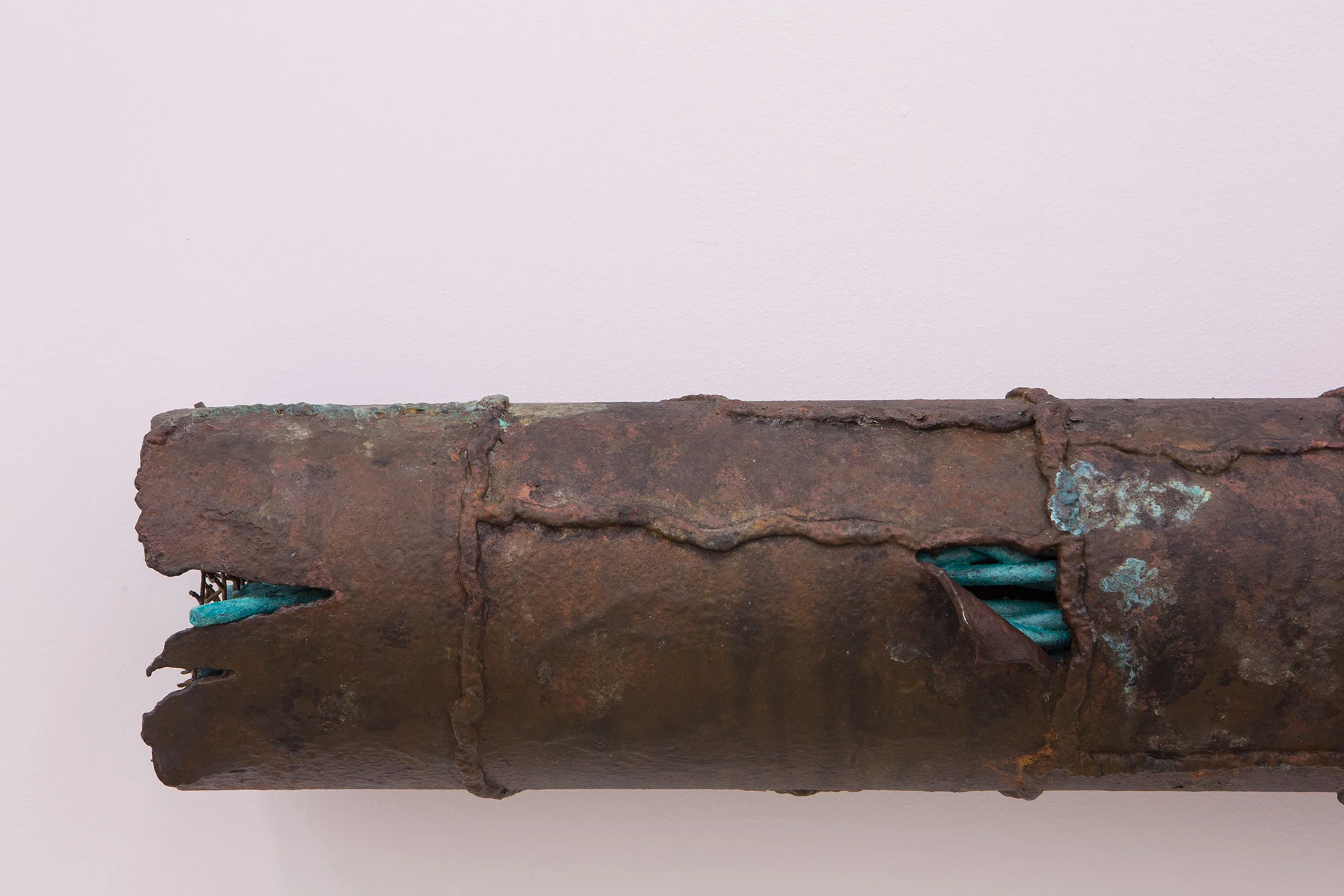 Lewis Fidock & Joshua Petherick, “Sleeve, Fe(NO3)3” (detail), 2017, PVC, modelling clay, wire, rubber, hydrochloric acid, synthetic insulation, raw pigment, metallic paint, ferric nitrate, textured effect paint, solvent base dye-oxide, archival satin varnish, 100 x Ø 15 cm