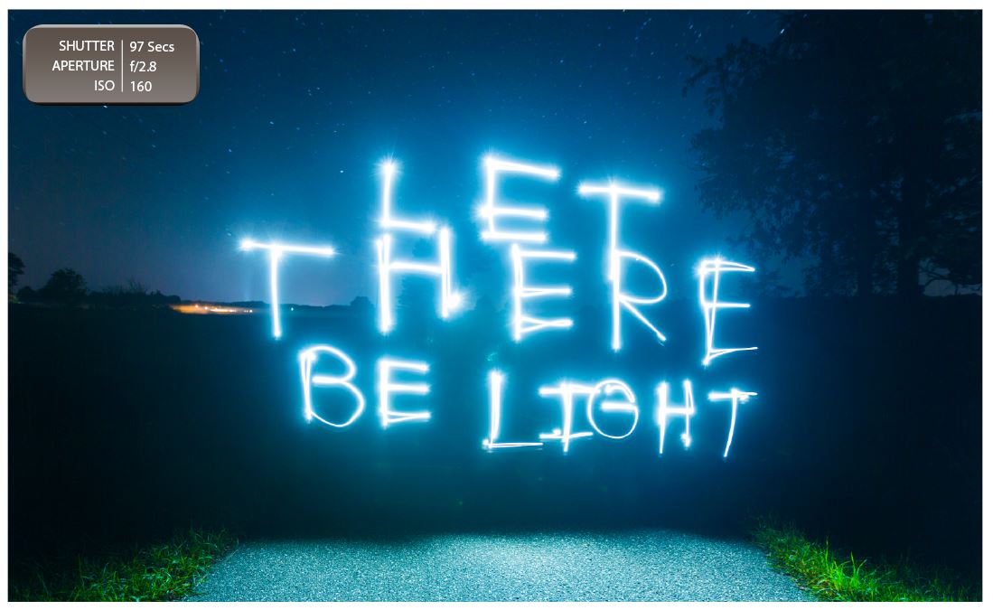 PAINT WITH LIGHT: Using a tripod, I set my camera up for a long exposure and, once I was in position, I used a shutter release remote to activate the camera. Once the shutter opened up, I began to write (backwards) in the air with a flashlight — producing this image.