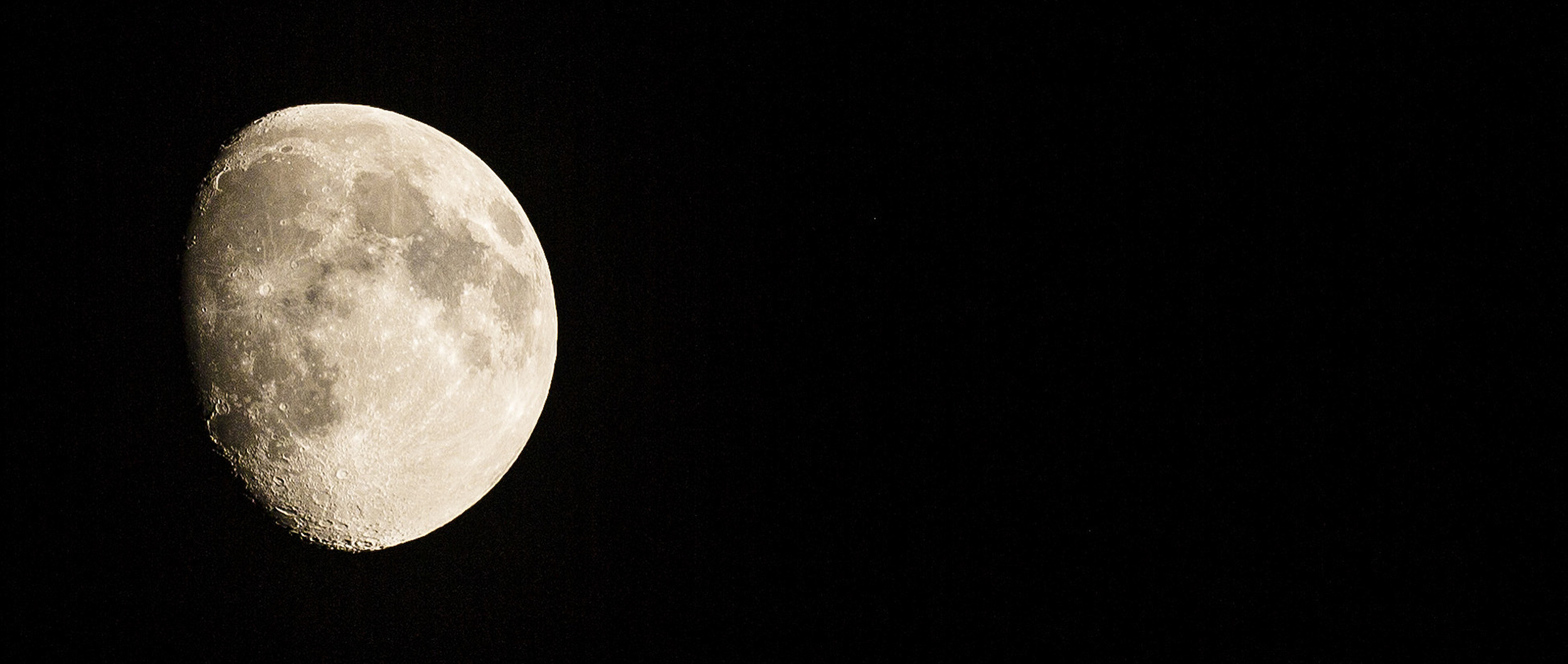 LUNAR LIGHT: Shooting images of the moon with a long lens is tricky yet fun. Be sure to keep in mind the phase of the moon before shooting. 