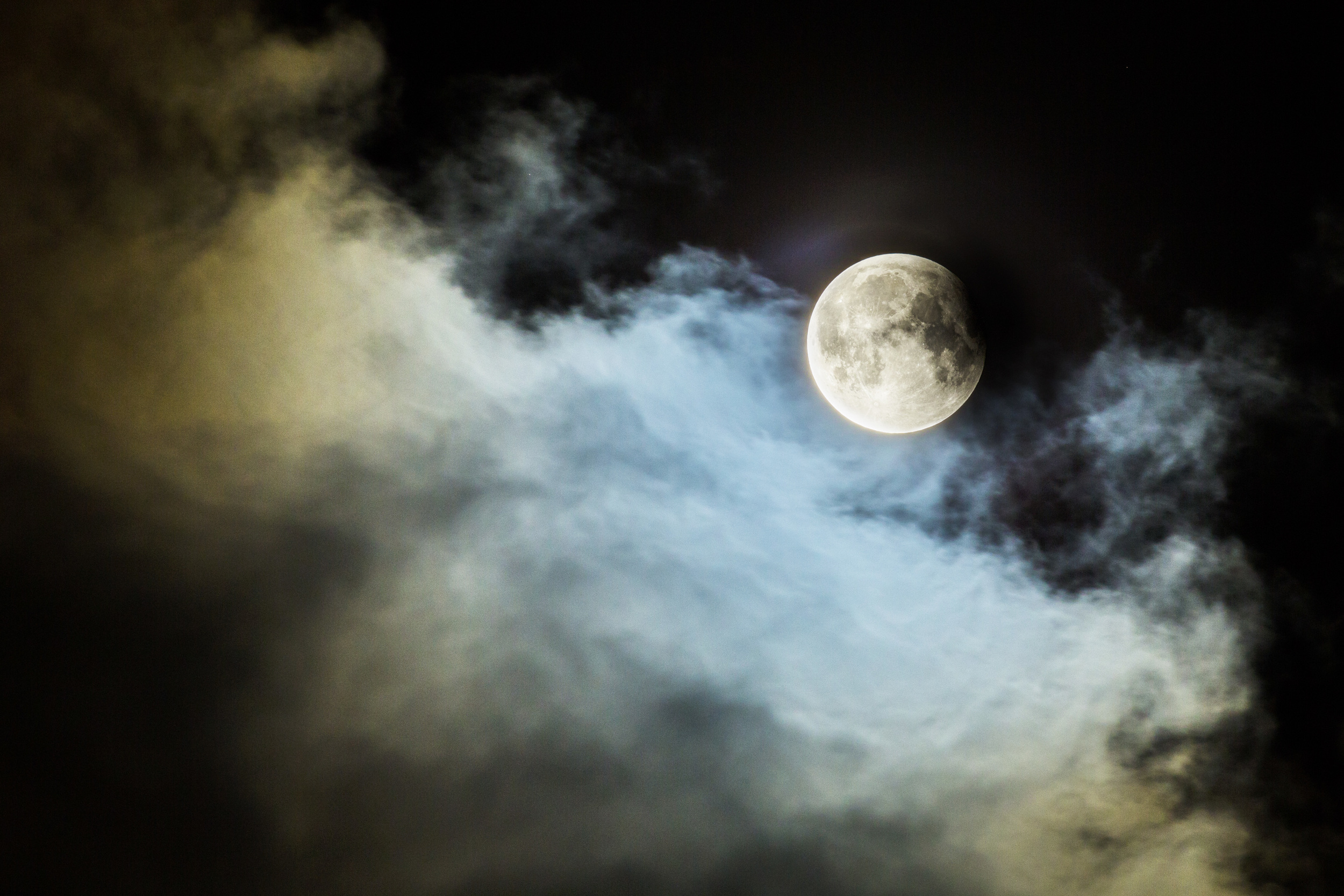 A BLOCKED VIEW: Much of the “super blood moon” was blocked from view last Sunday by cloud-cover. Pictured is the moon just as it exited the shadow of Earth.