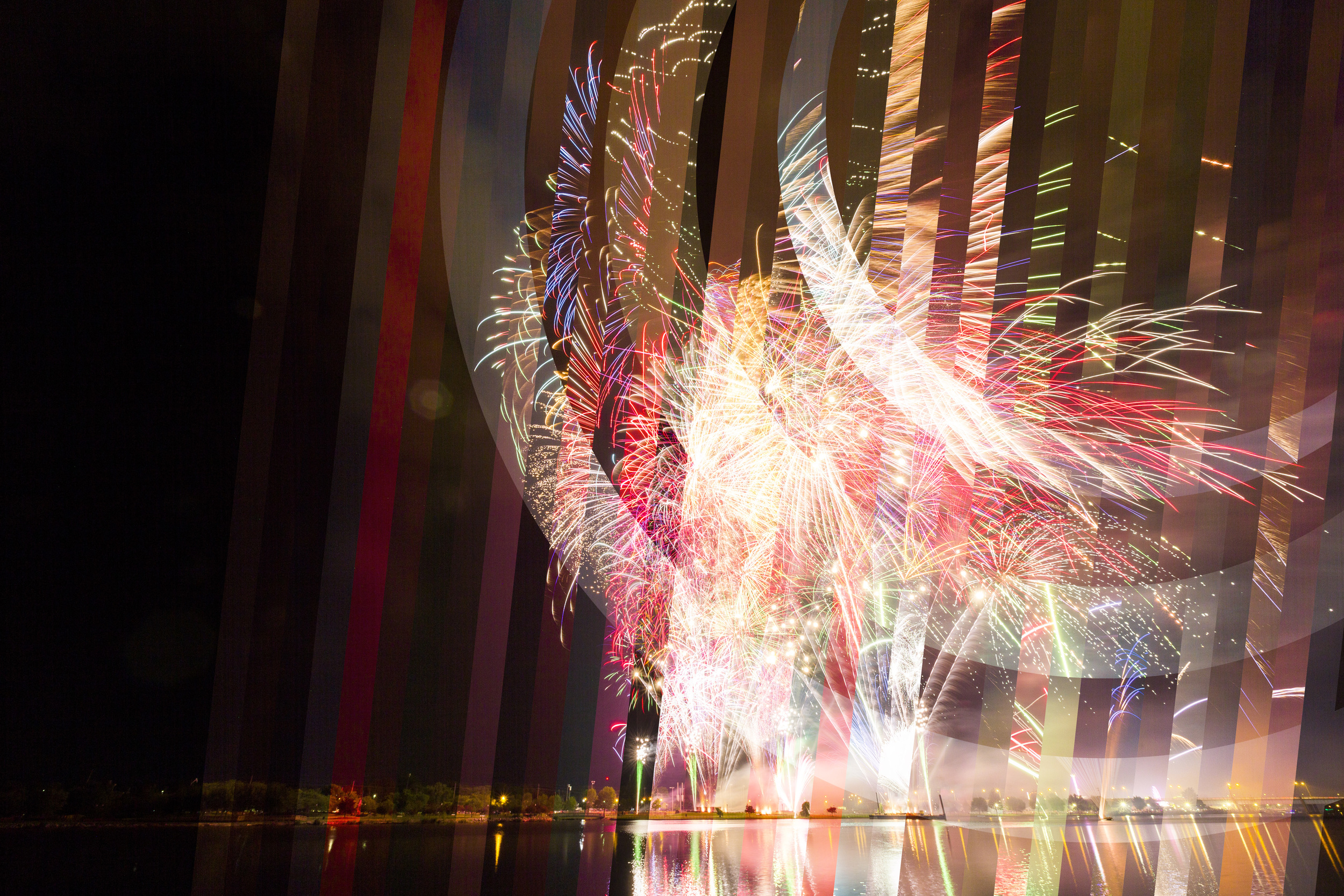 ALL IN ONE: Using Adobe Photoshop’s masking tools I was able to make a composite photograph of the Bay City fireworks for Independence Day. From left to right, each diagonal line features a 10 second long exposure and represents the passage of time throughout the show.