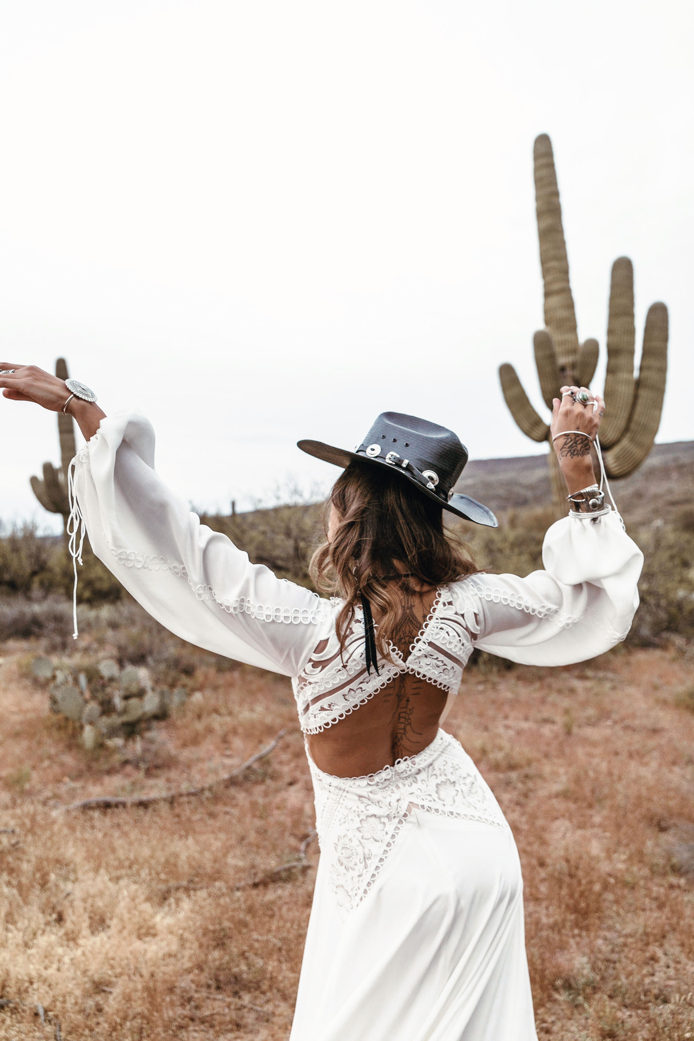  Presley Gown | Rue De Seine | Rue De Seine Bridal | Moonrise Canyon Collection 2019 | wild west inspired | free spirited bride | boho wedding | bohemian | boho bride | wedding Gown | bridal gown | plunging neckline, fitted bodice with side cut out, 