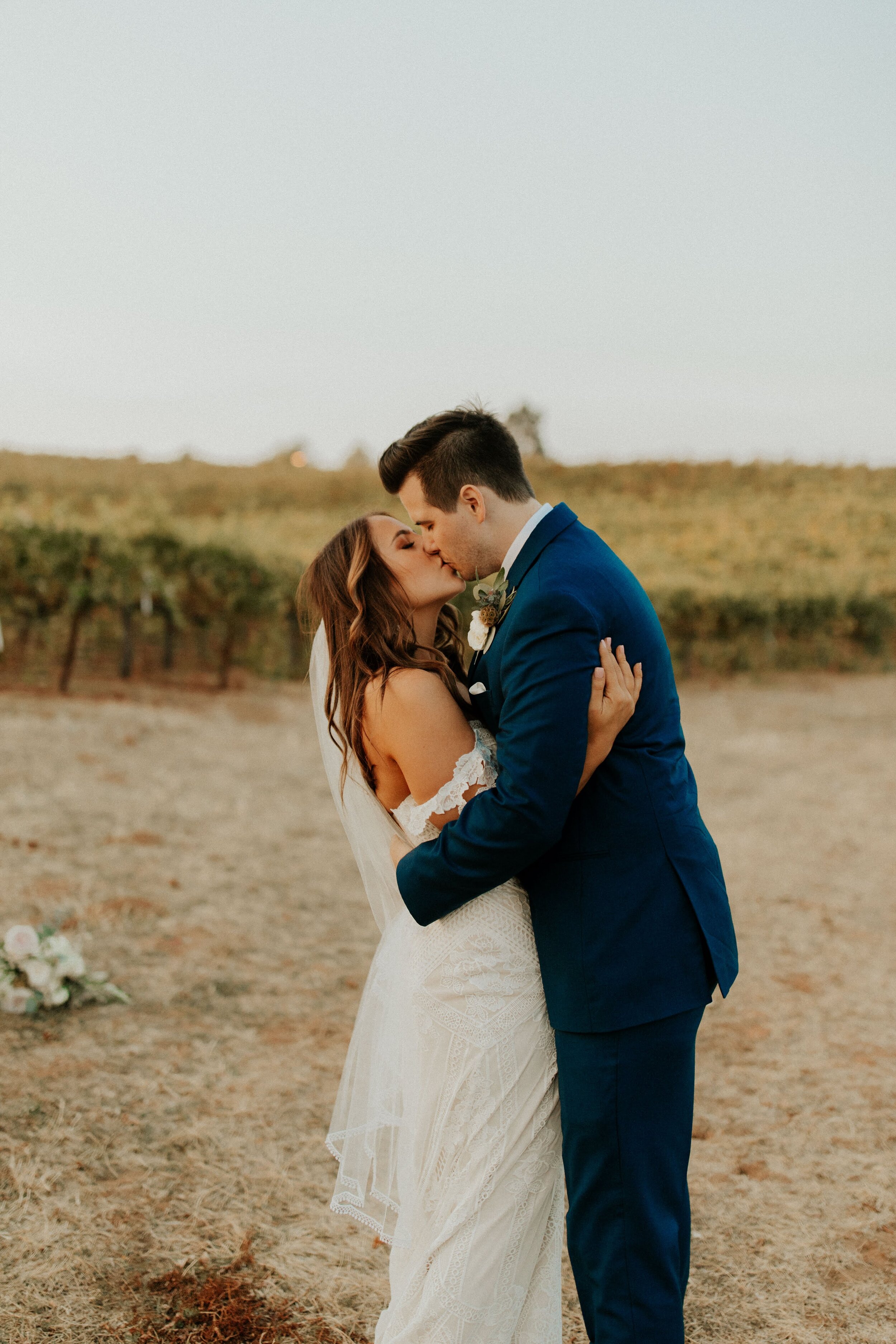 Boho california vineyard wedding  Gown: Rue De Seine via Swoon Bridal Reno NV | Veil: Sara Gabriel | Earrings: A.B. Ellie | Photographer: Taylor Kern | Venue: Helwig Winery | Florals: Esmae Floral