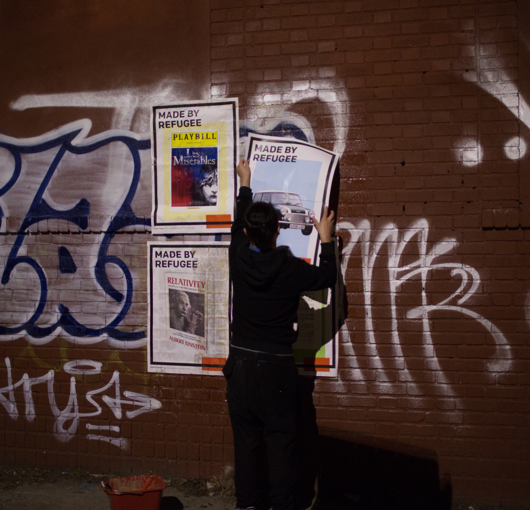 Early in the morning, the posters were quietly wheatpasted.