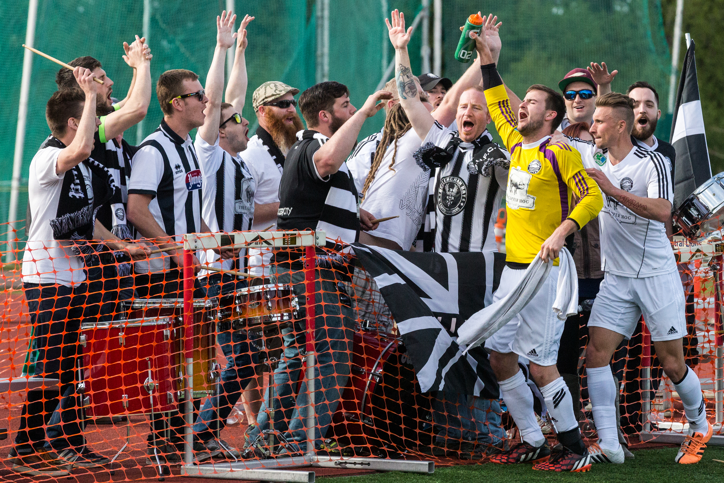  The Bellingham United supporters group, the Black and White Army, cheers with players despite a tough 5-1 loss against South Sound FC on Sunday, April 26, at Civic Field.&nbsp; 