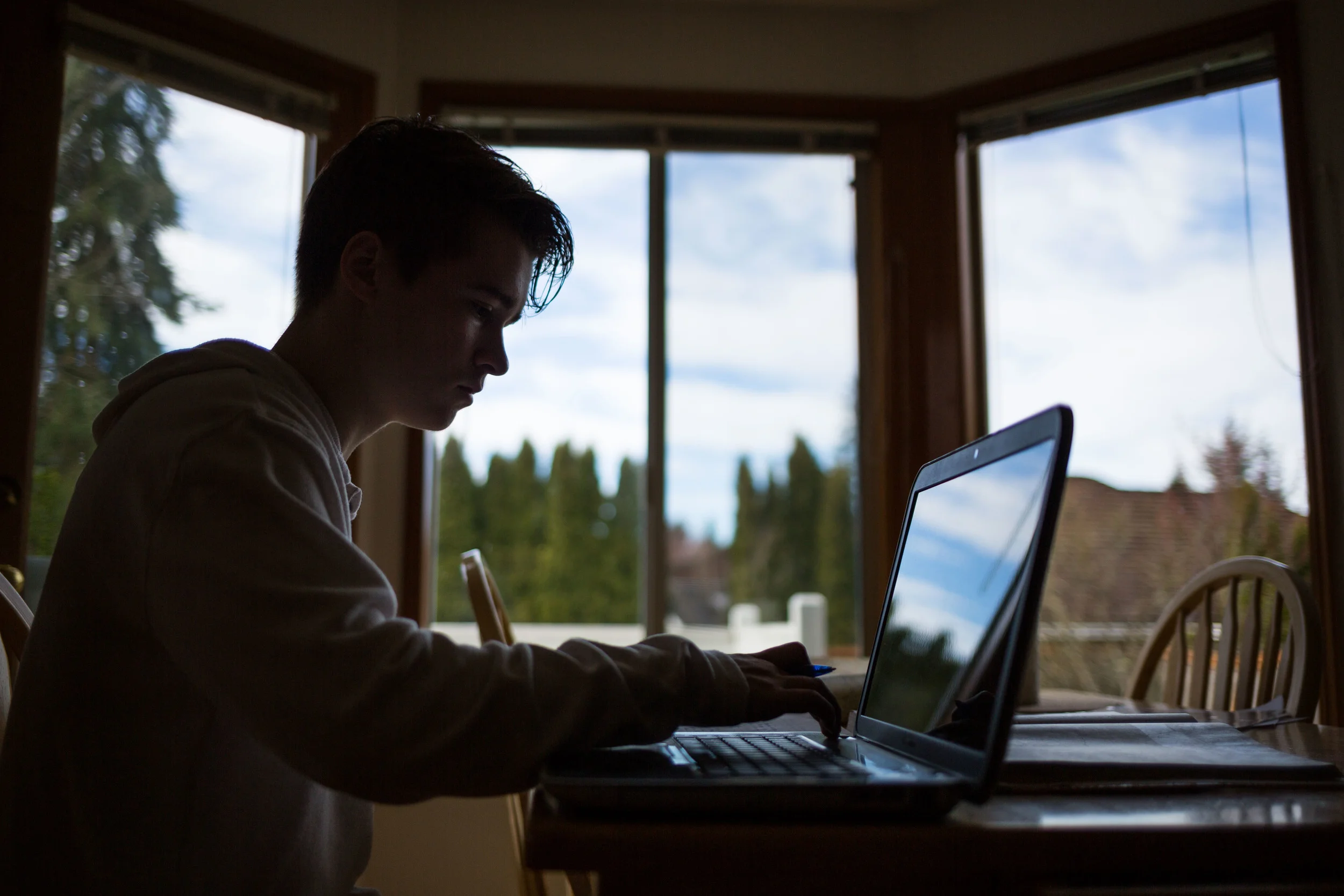 BRADEN HANSEN USES HIS COMPUTER FOR HOMEWORK AT HIS HOME IN MUKILTEO. TO HELP DEAL WITH HIS DISORDER, HANSEN ADHERES TO SOME RECOMMENDATIONS TO HELP REDUCE FATIGUE LIKE AVOIDING ALCOHOL AND NICOTINE. For Klipsun Magazine