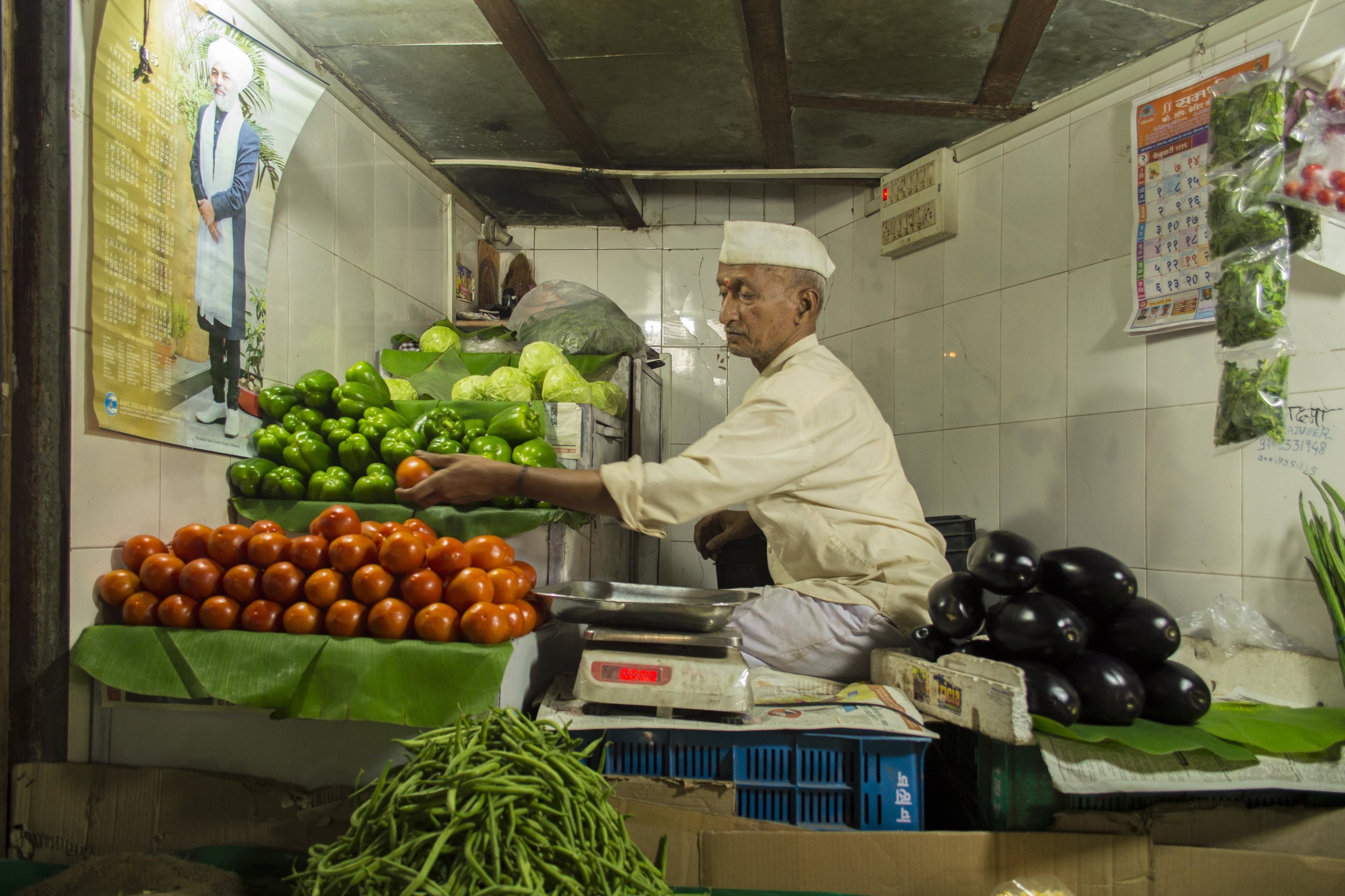 Vegetable wallah in Mumbai's Crawford Market