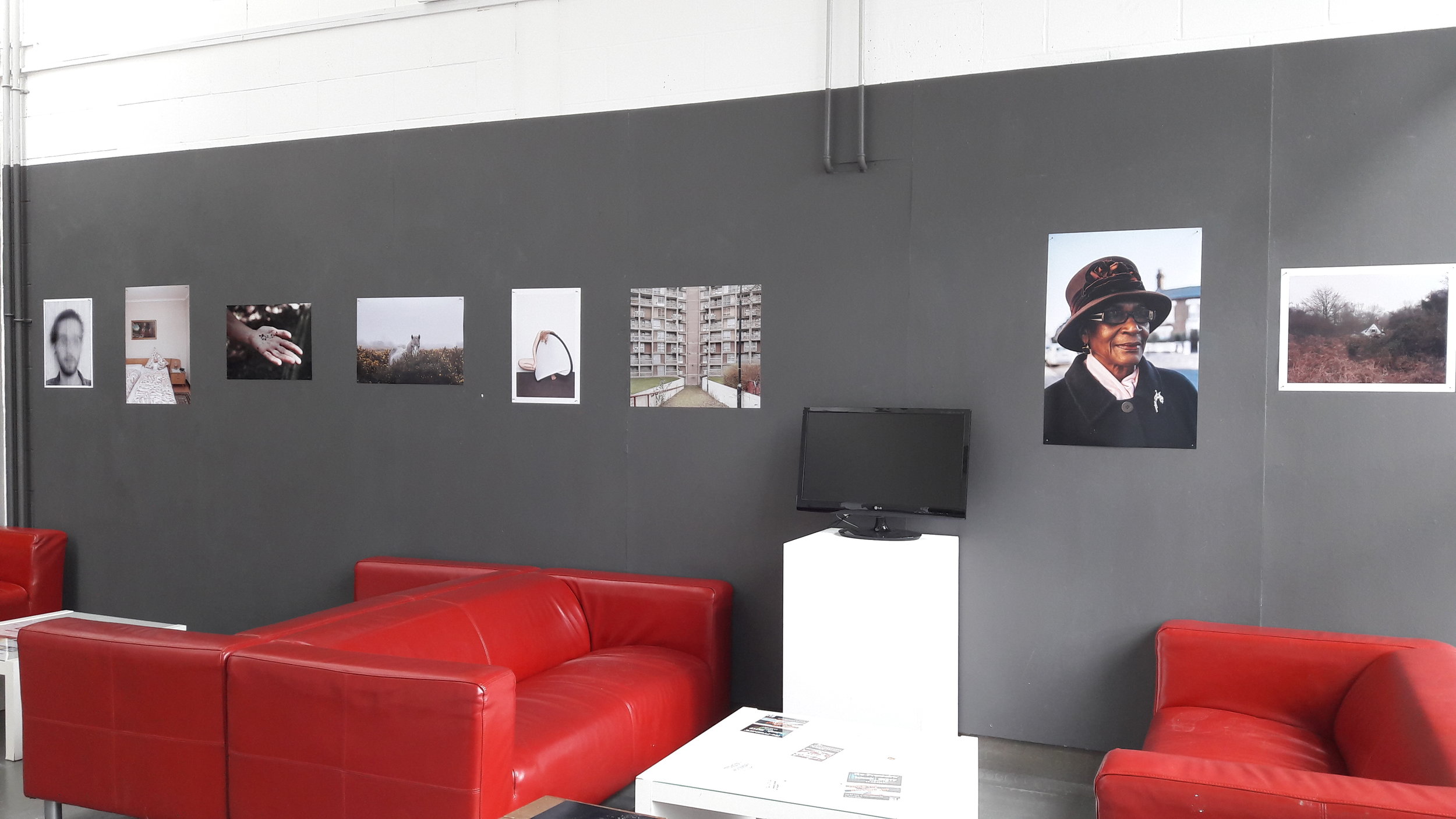 Installation image of some of the work at the Arts Café (From left to right: Liam Collins, Christina Stohn, Victoria Chetley, Marie-Louise Garratt, Jocelyn Allen, Leticia Batty, Matt MacPake, Alastair Bartlett)
